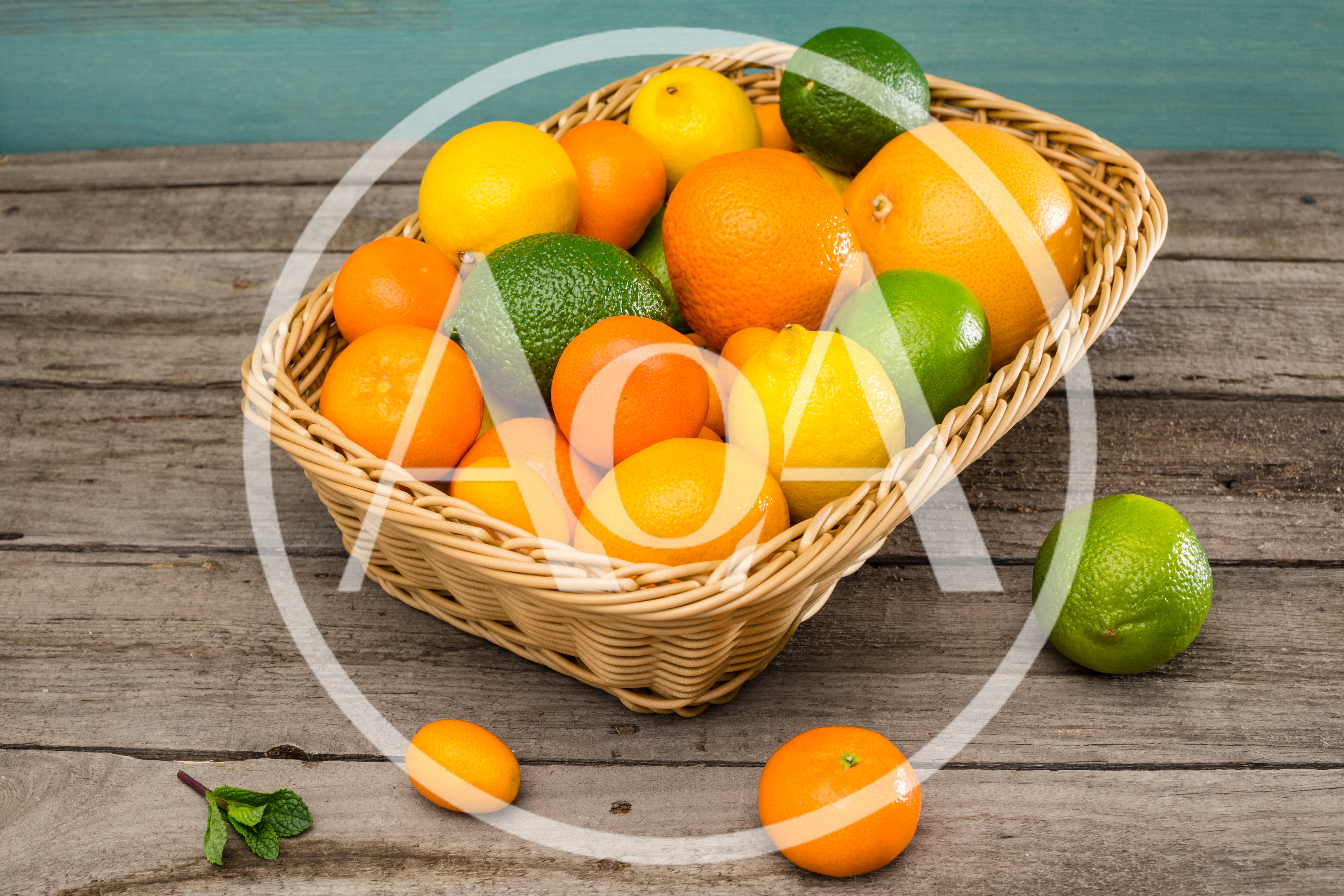 Assorted Citrus Fruits In A Wicker Basket