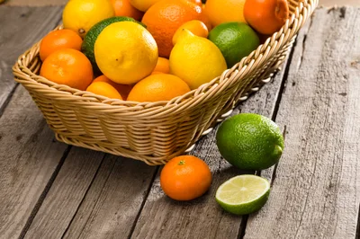 Fresh Citrus Fruits In A Wicker Basket
