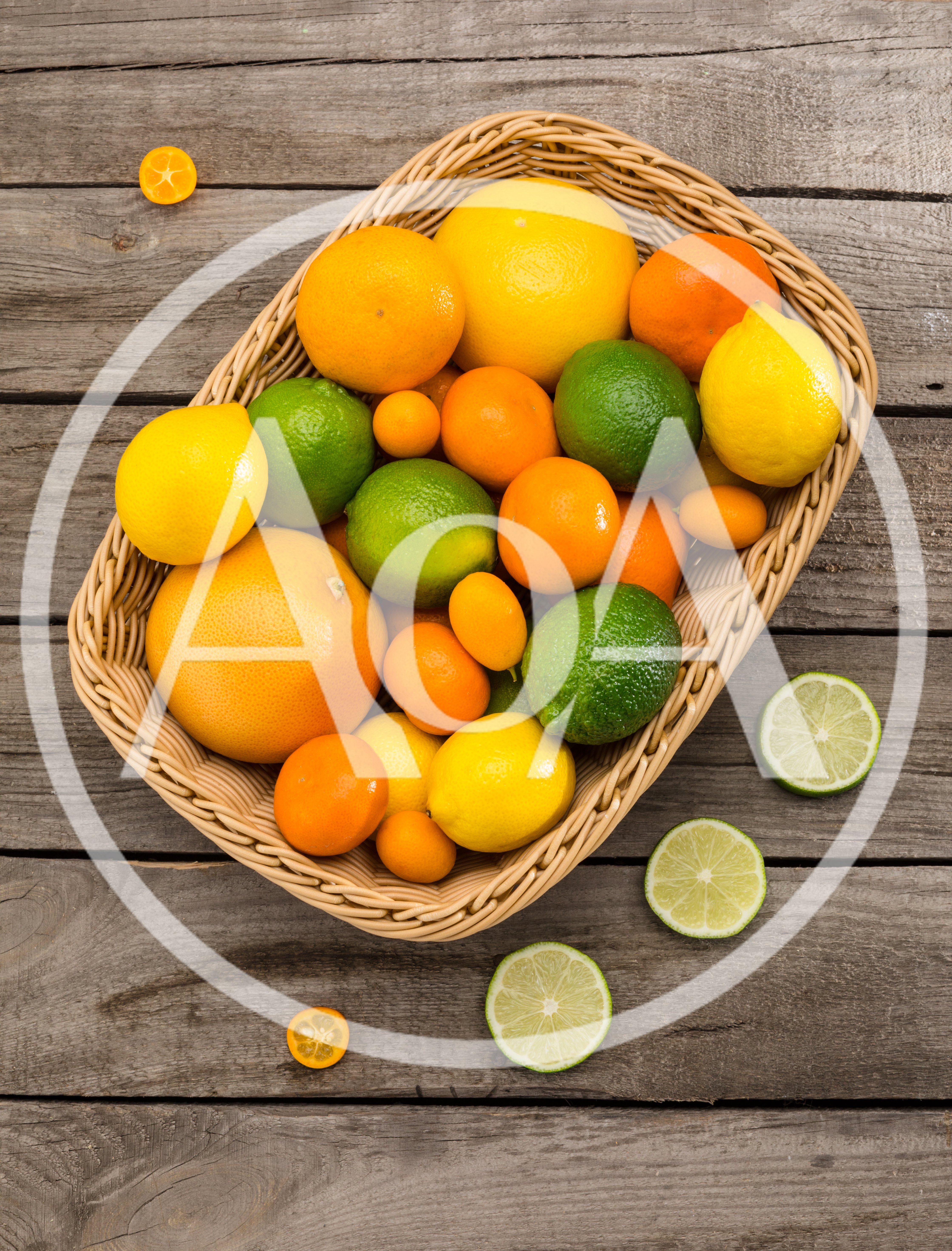 Assorted Citrus Fruits In A Wicker Basket