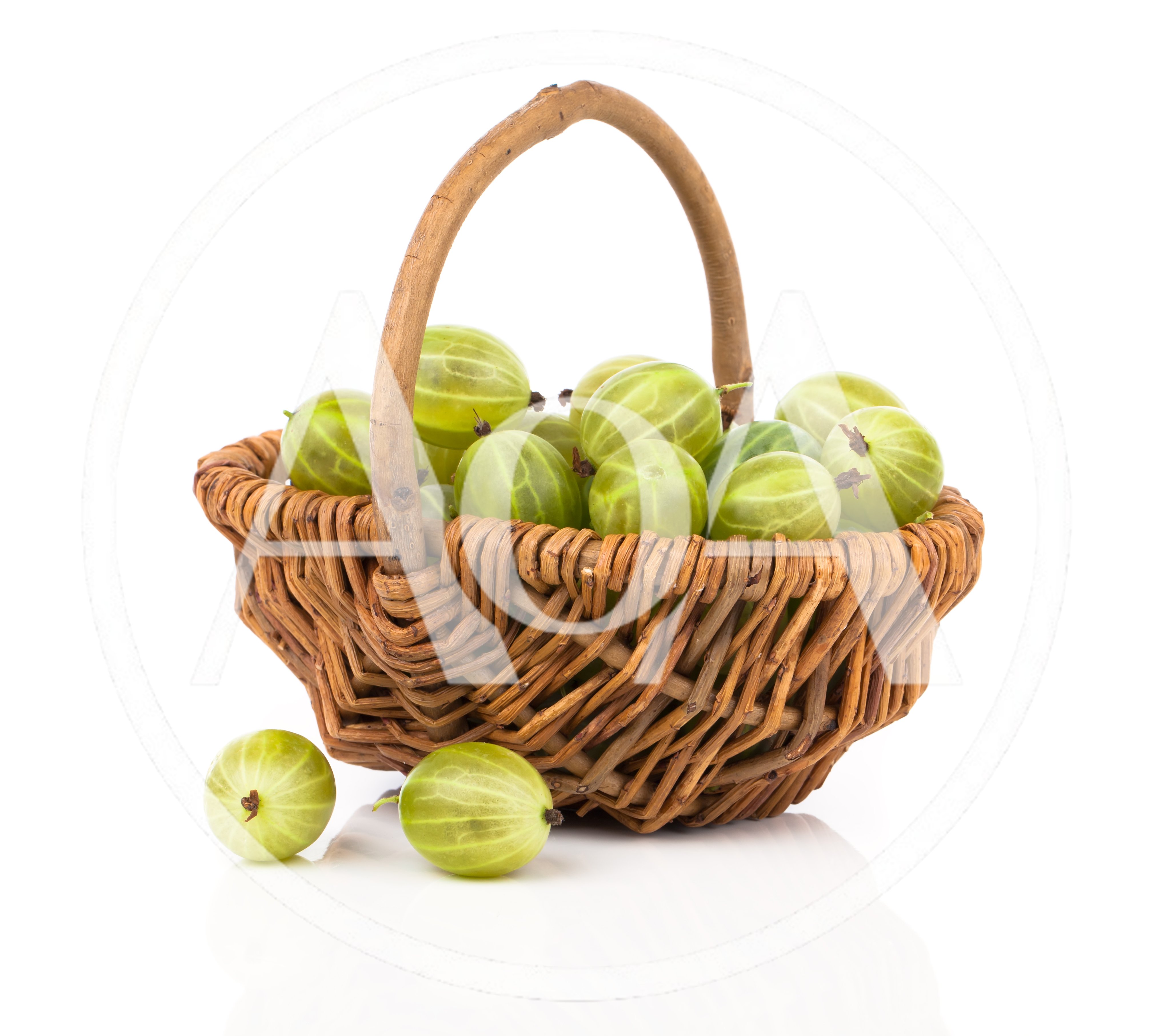Fresh Green Gooseberries In A Woven Basket