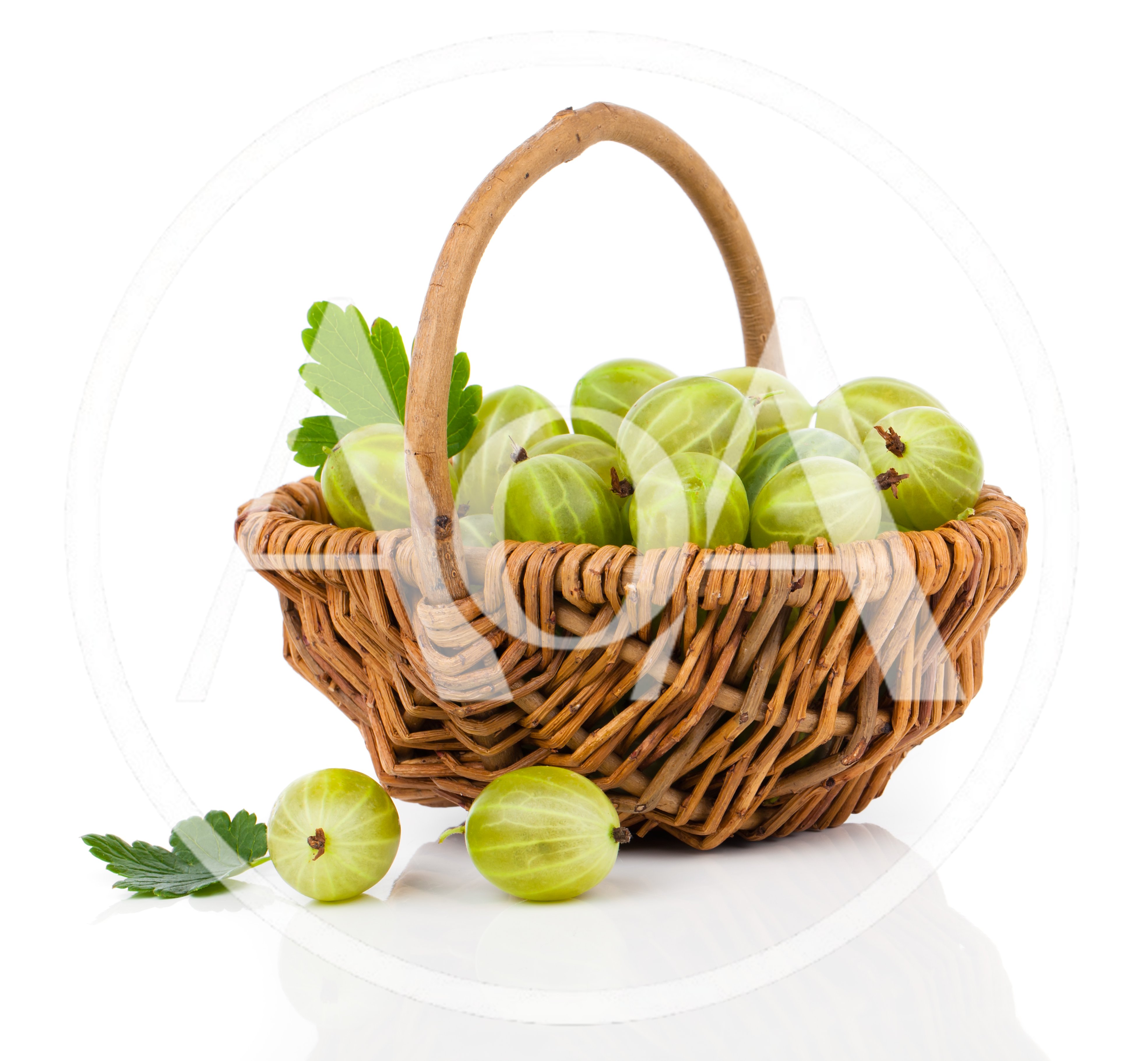 Fresh Green Gooseberries In A Wicker Basket