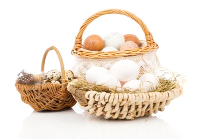 Three Wicker Baskets Filled With Assorted Easter Eggs
