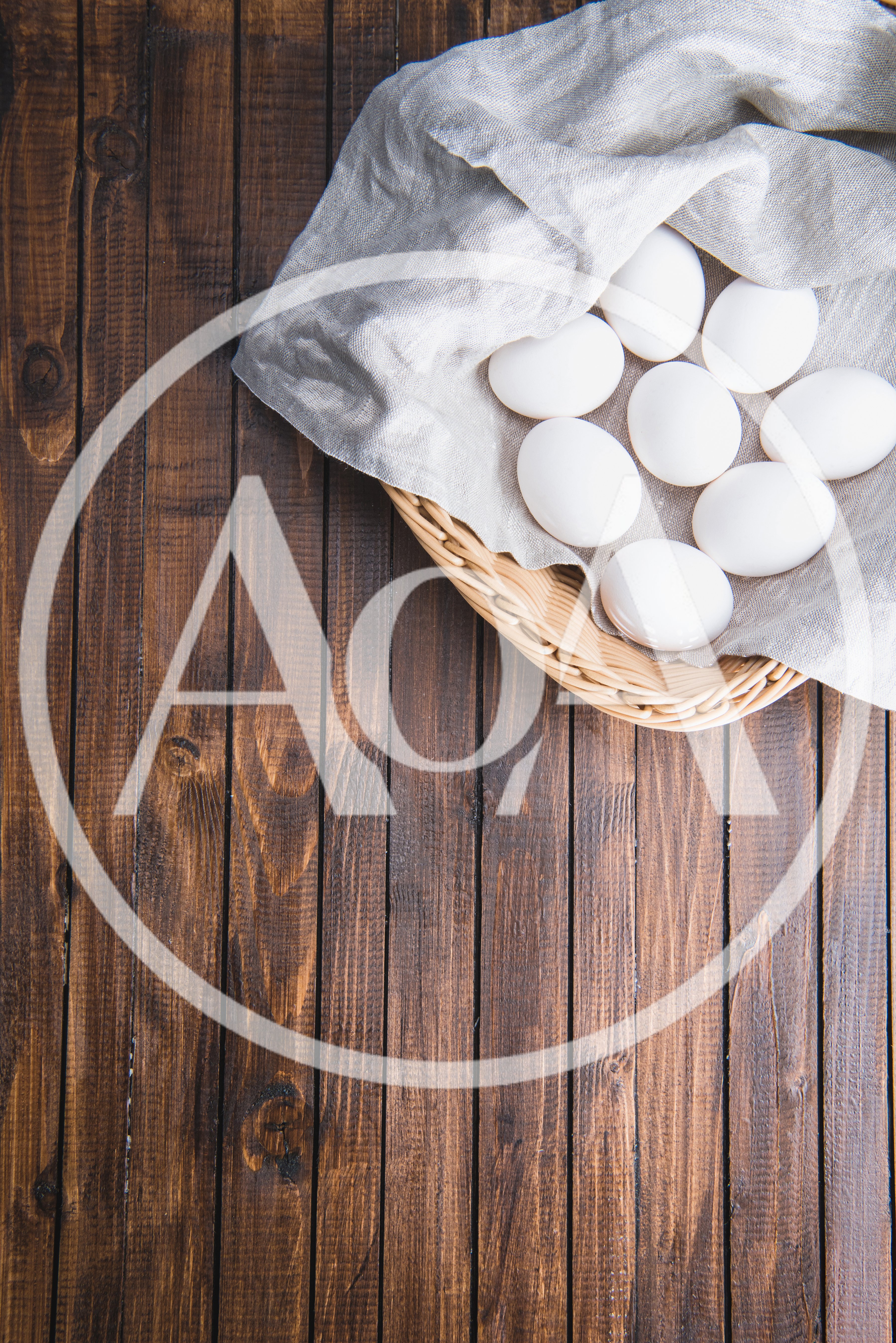 White Chicken Eggs In A Wicker Basket