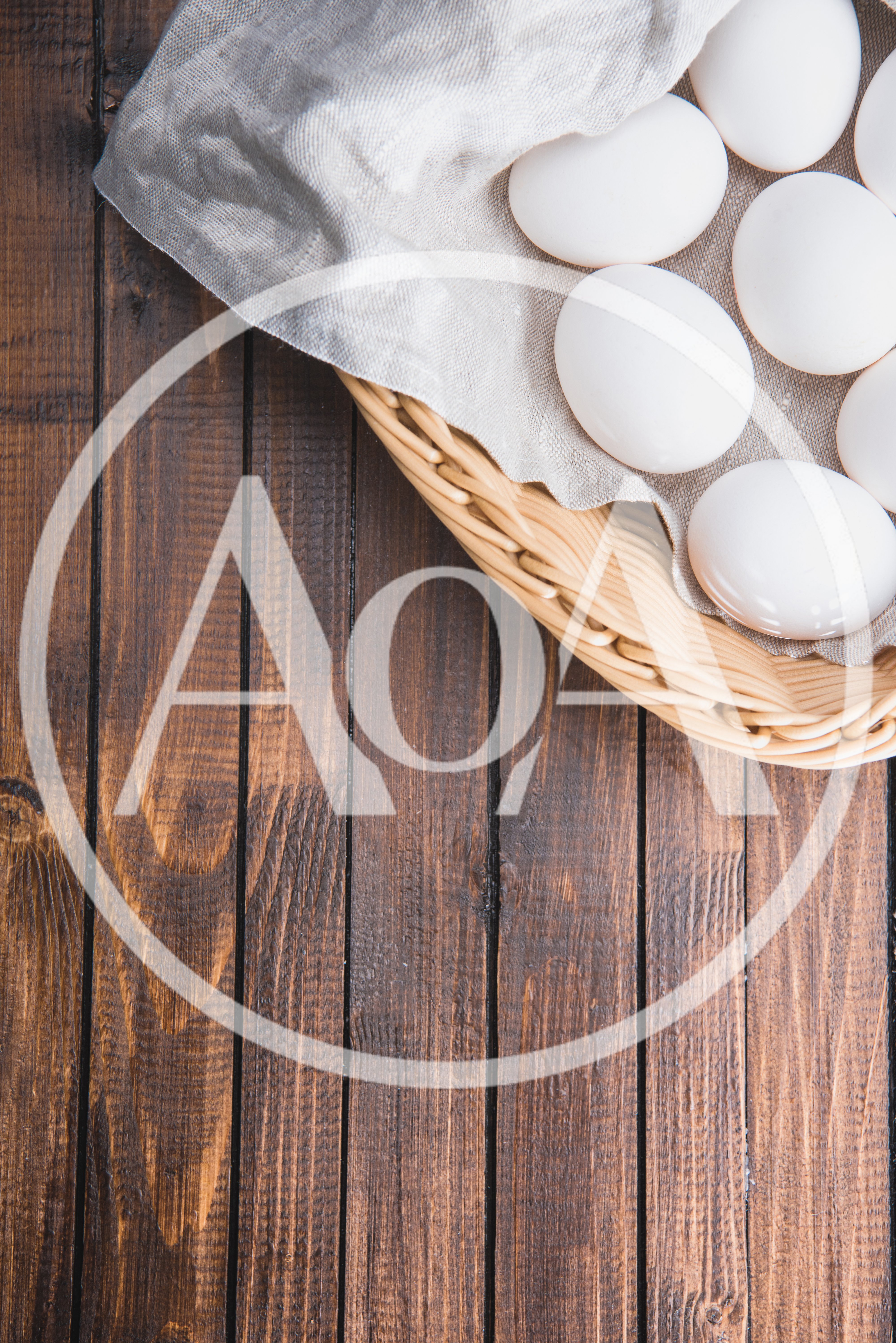 White Chicken Eggs In A Wicker Basket