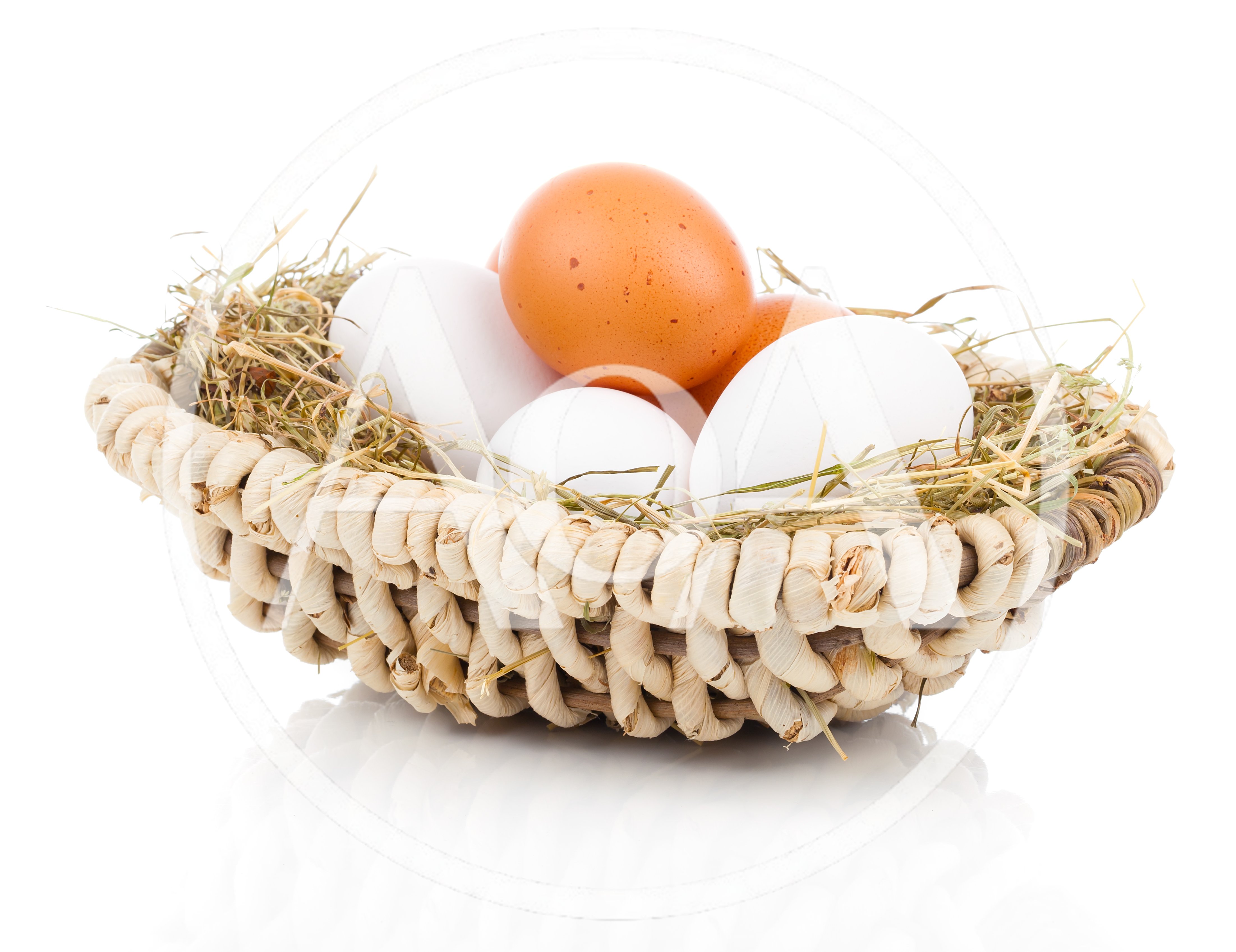 Fresh Chicken Eggs In A Woven Straw Basket