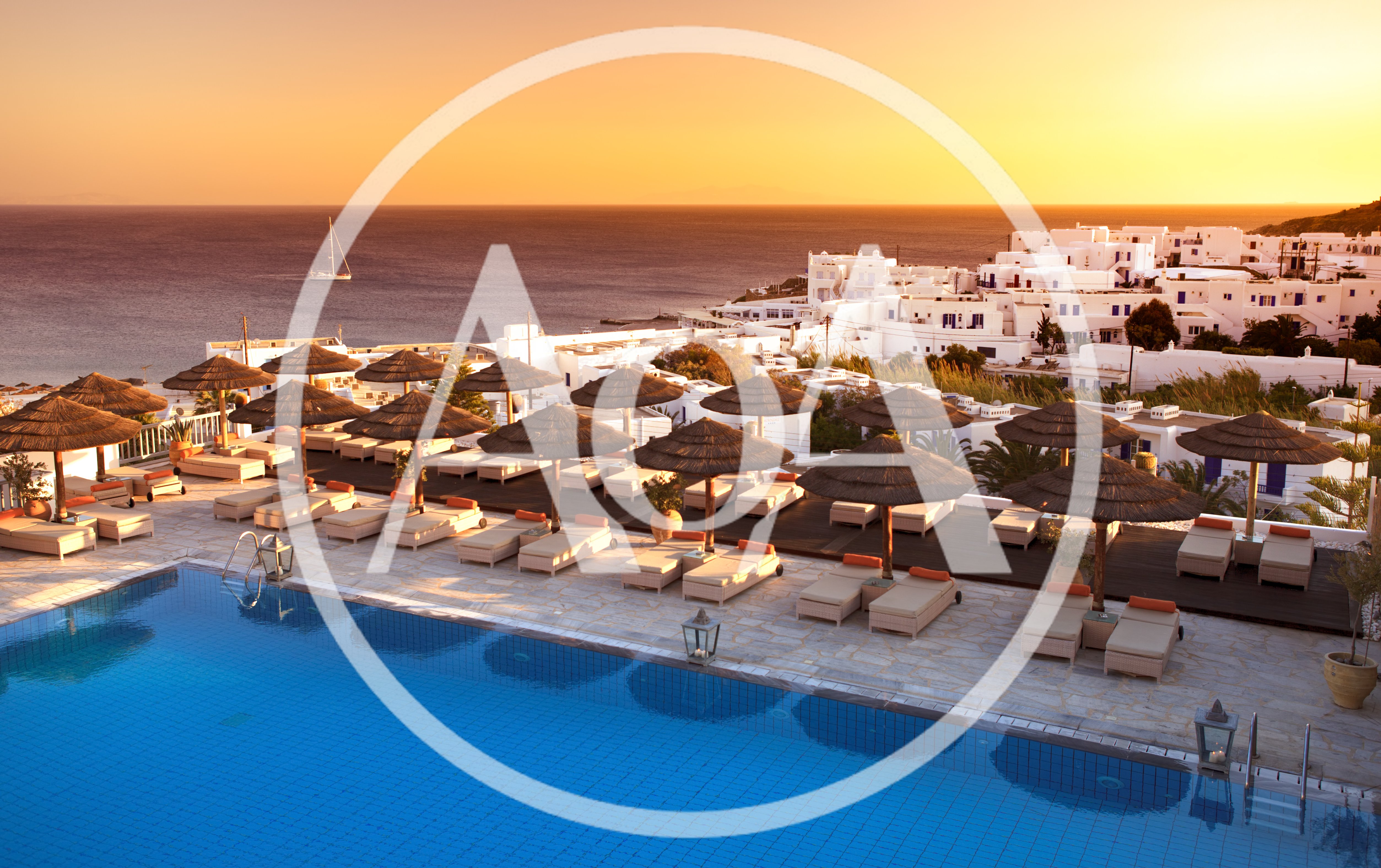 Luxury Resort Swimming Pool At Sunset In Greece