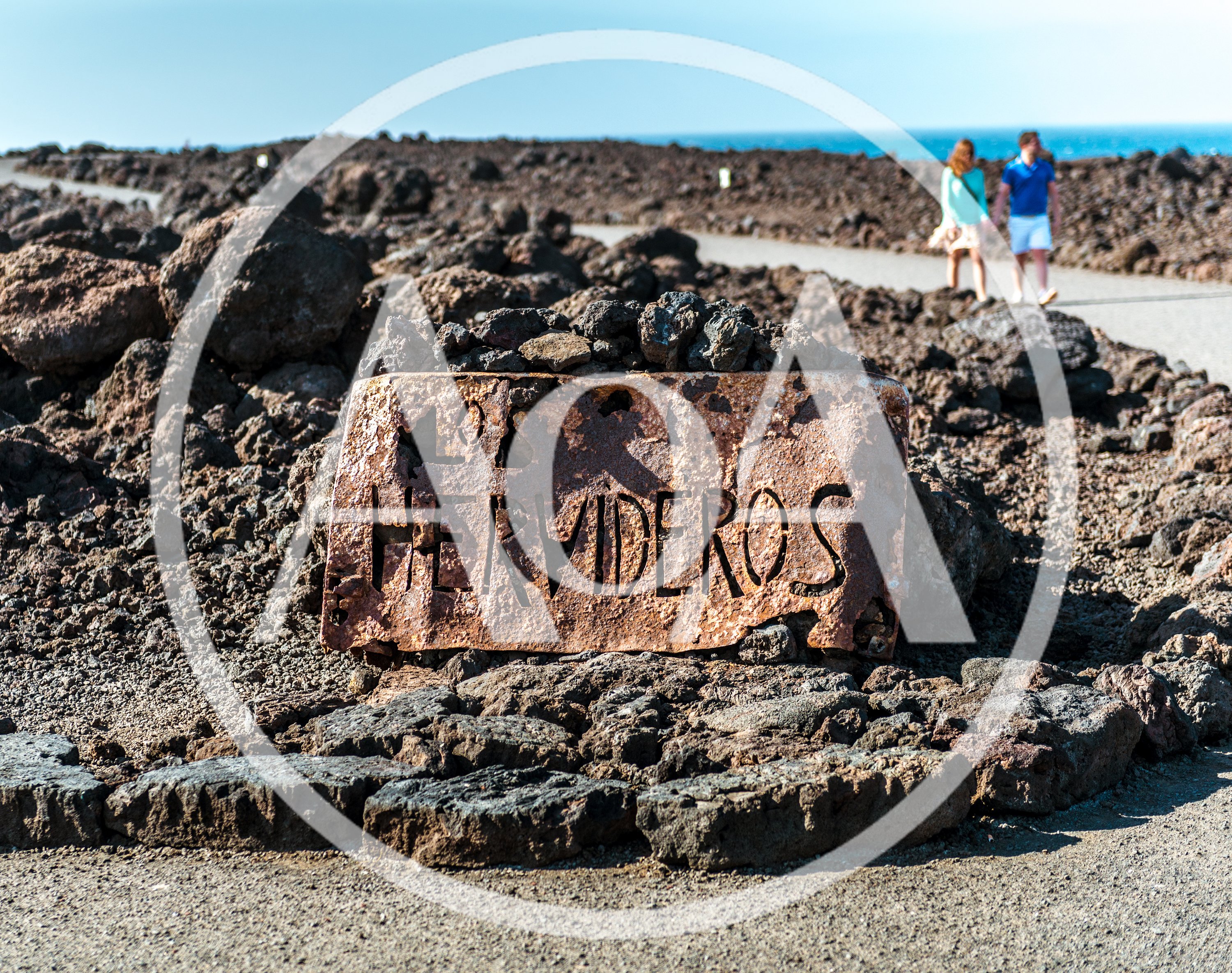 Rusty Los Hervideros Sign In Lanzarote Volcanic Landscape
