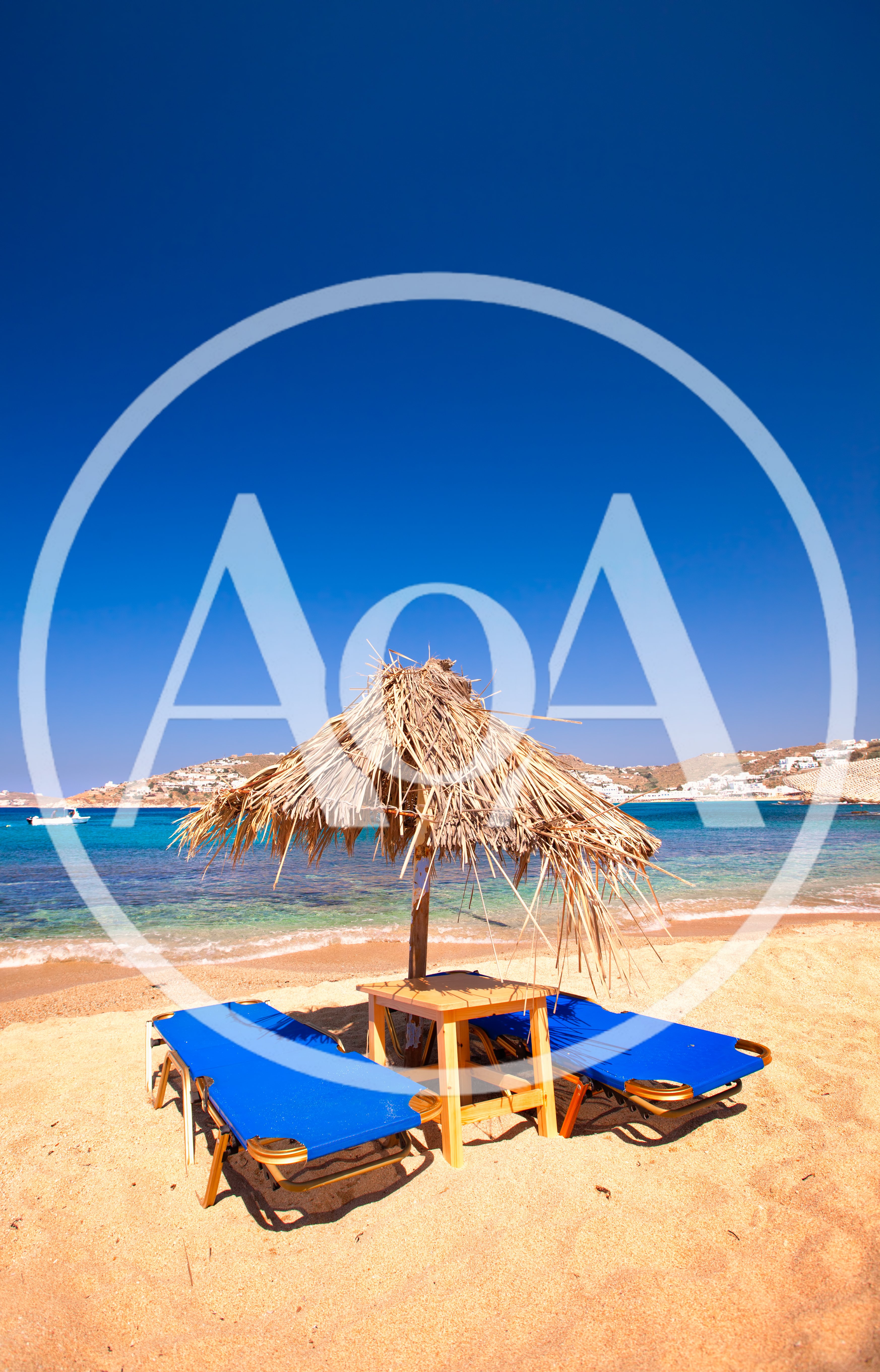Straw Beach Umbrella With Blue Sun Loungers