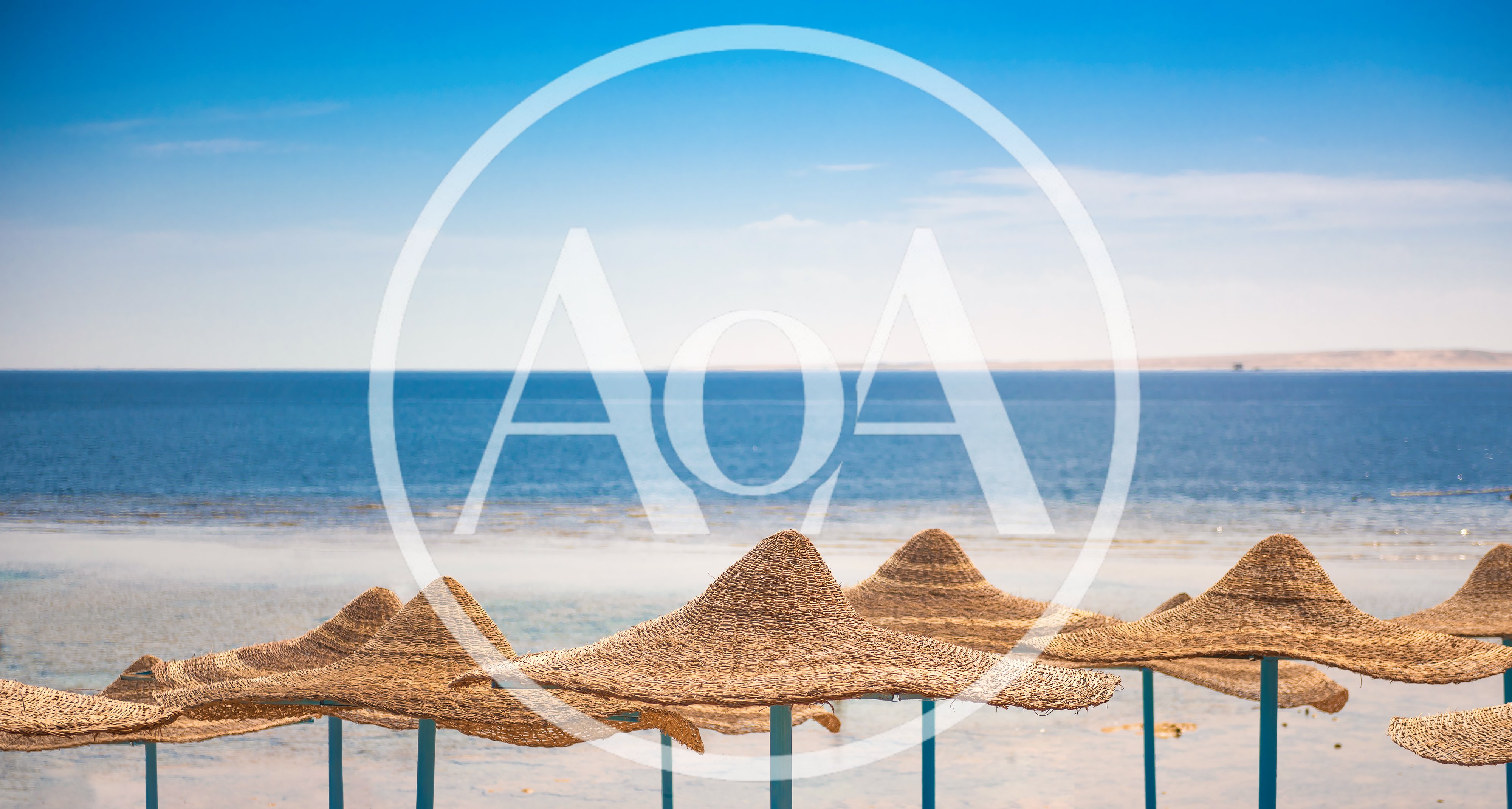Straw Beach Umbrellas Overlooking The Red Sea