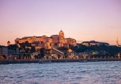 Buda Castle At Sunset Over The Danube River