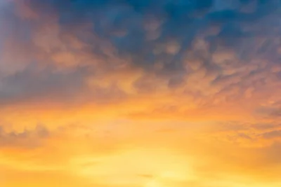 Dramatic Sunset Sky With Golden Clouds