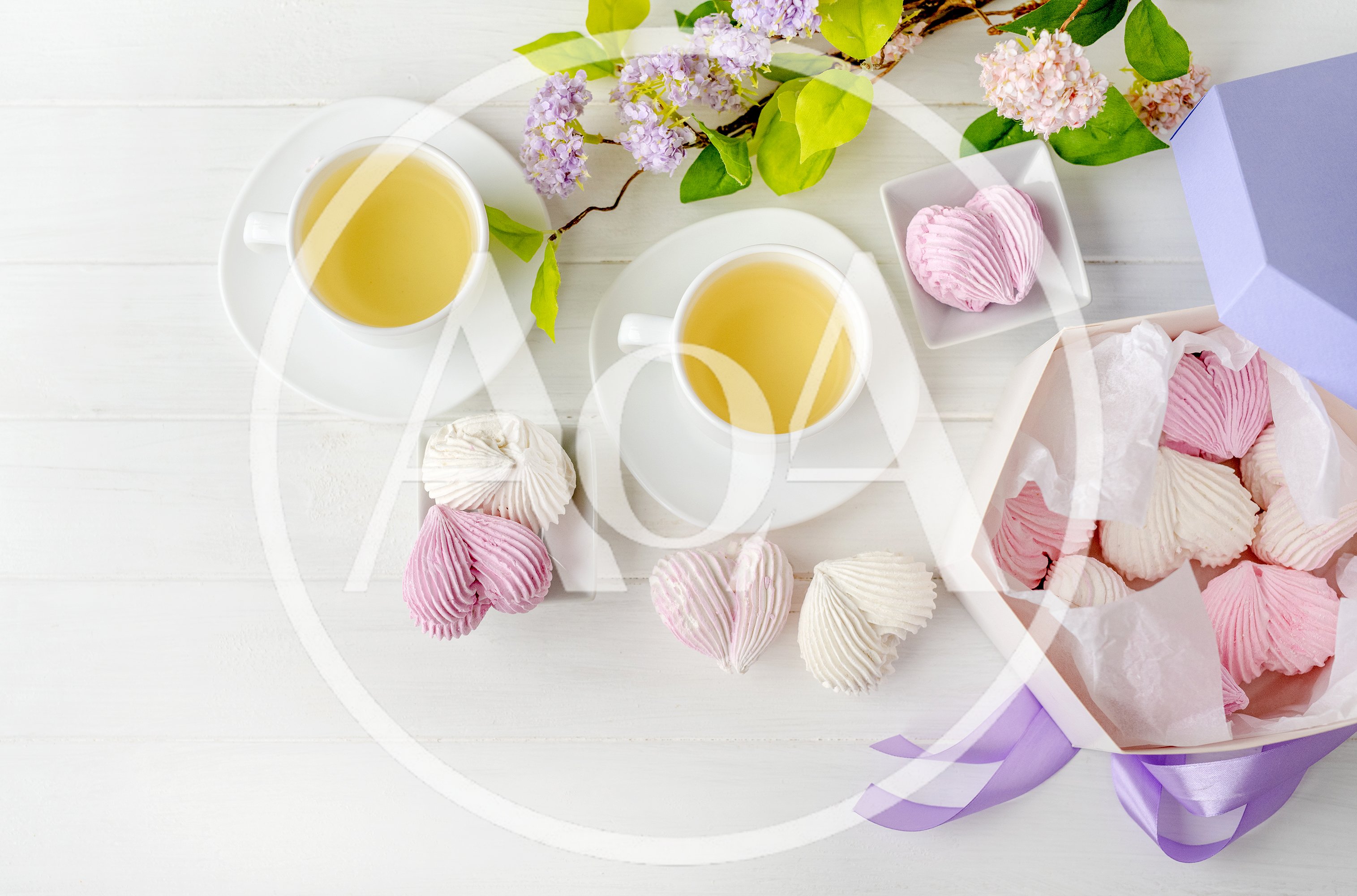 Tea Time With Heart Shaped Marshmallows And Lilacs