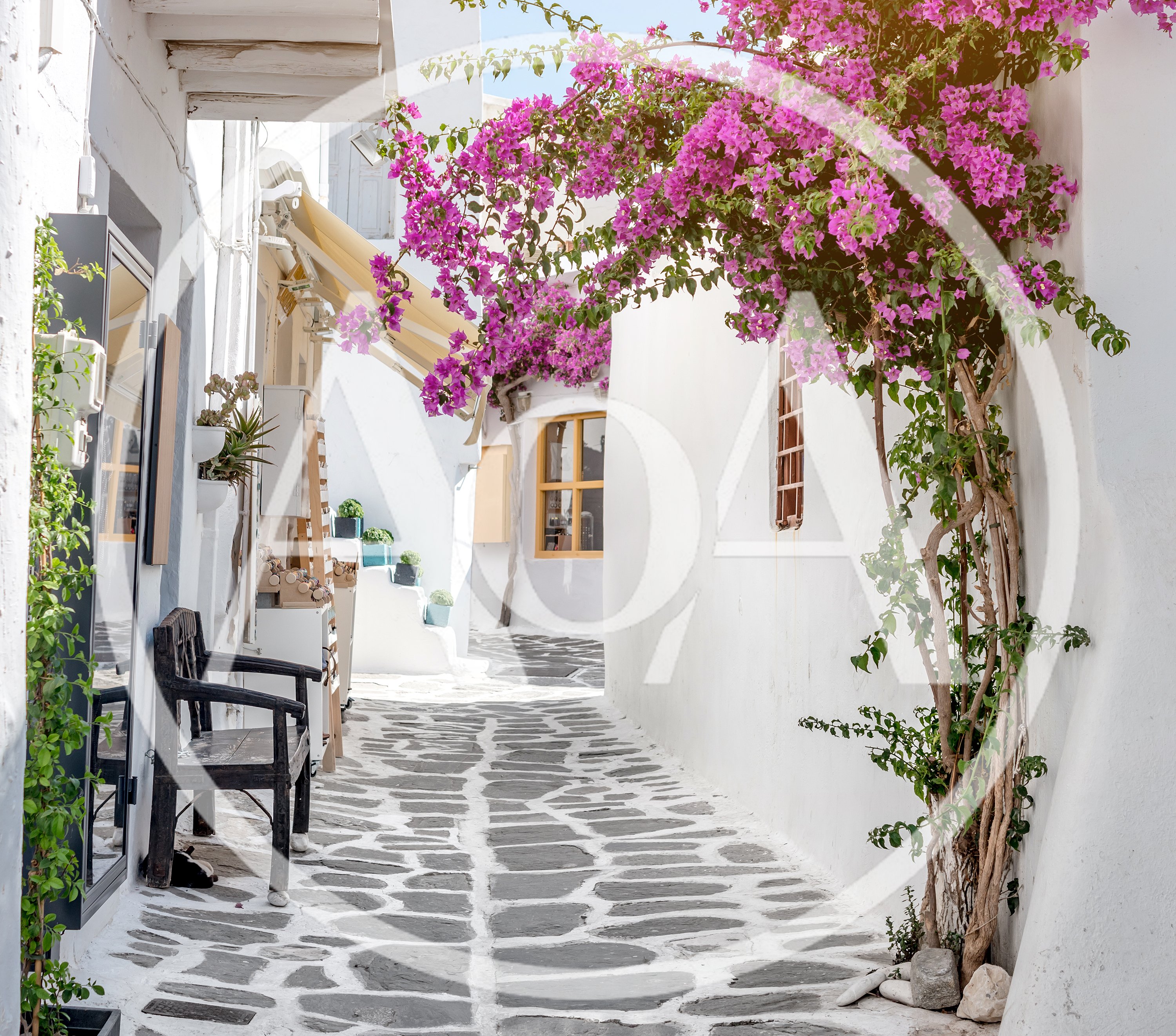 Narrow Cobblestone Alleyway In Mykonos Greece