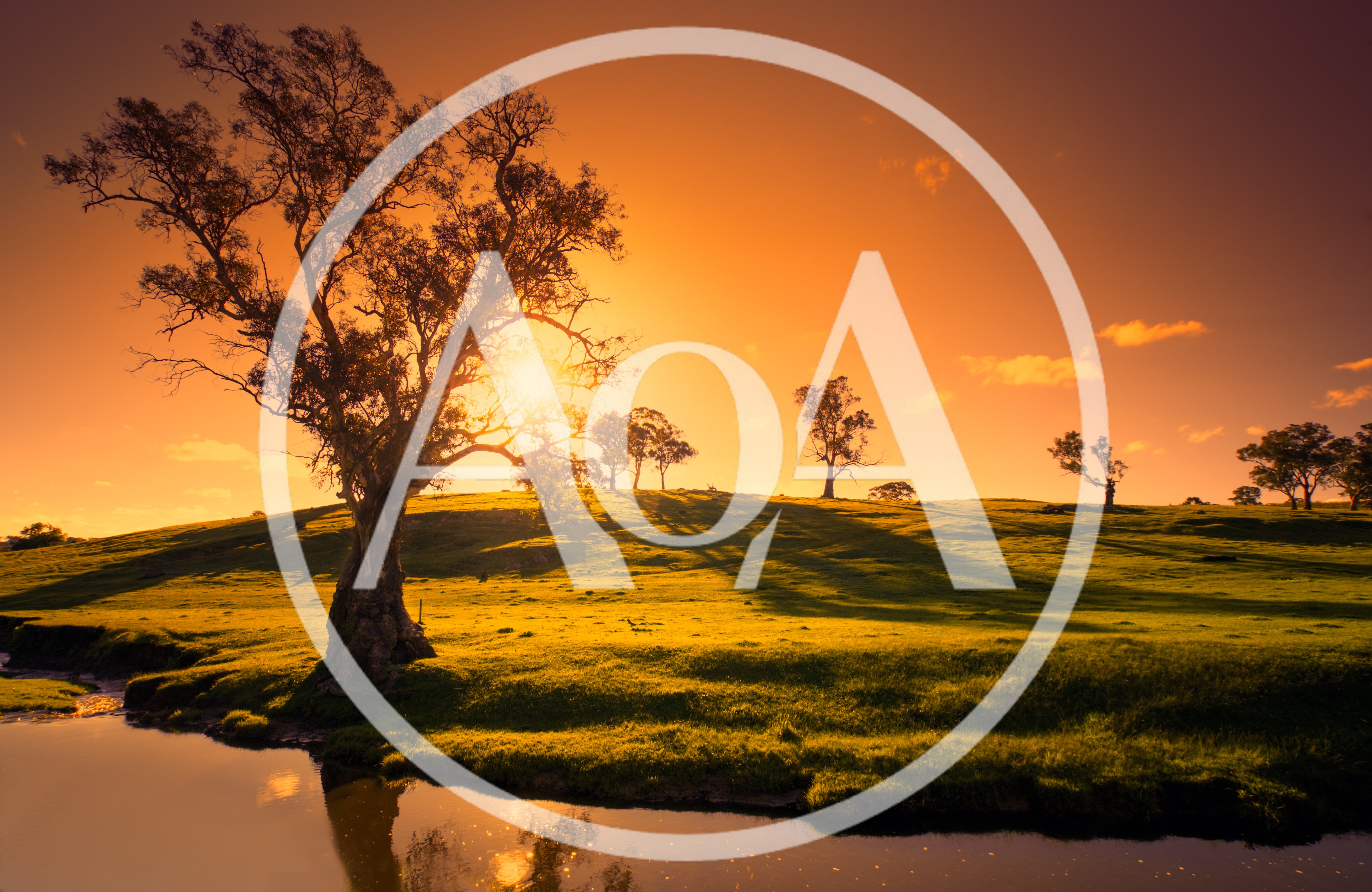 Golden Sunset Over Rolling Green Hills And River