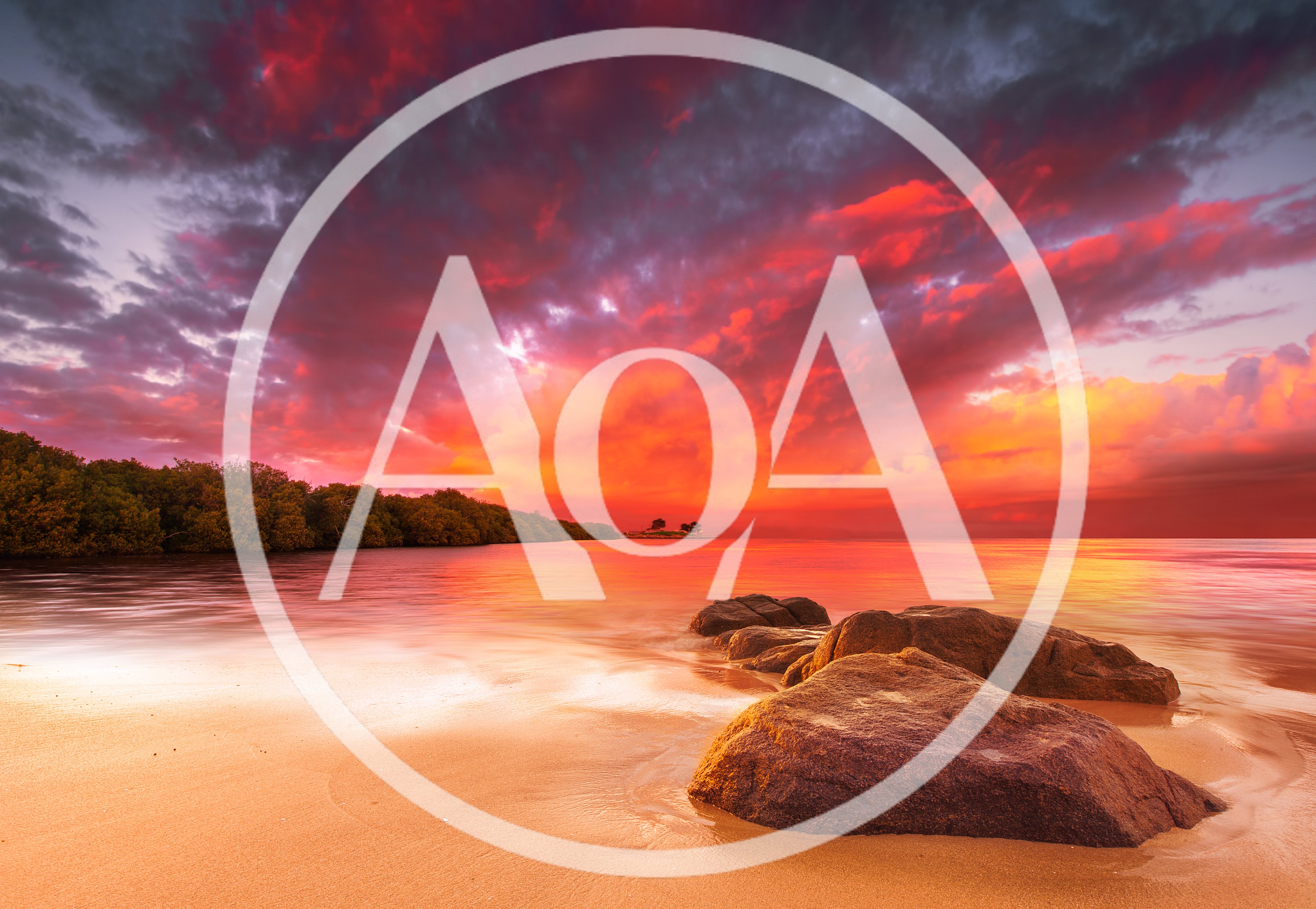 Dramatic Sunset Over Tropical Beach With Large Rocks