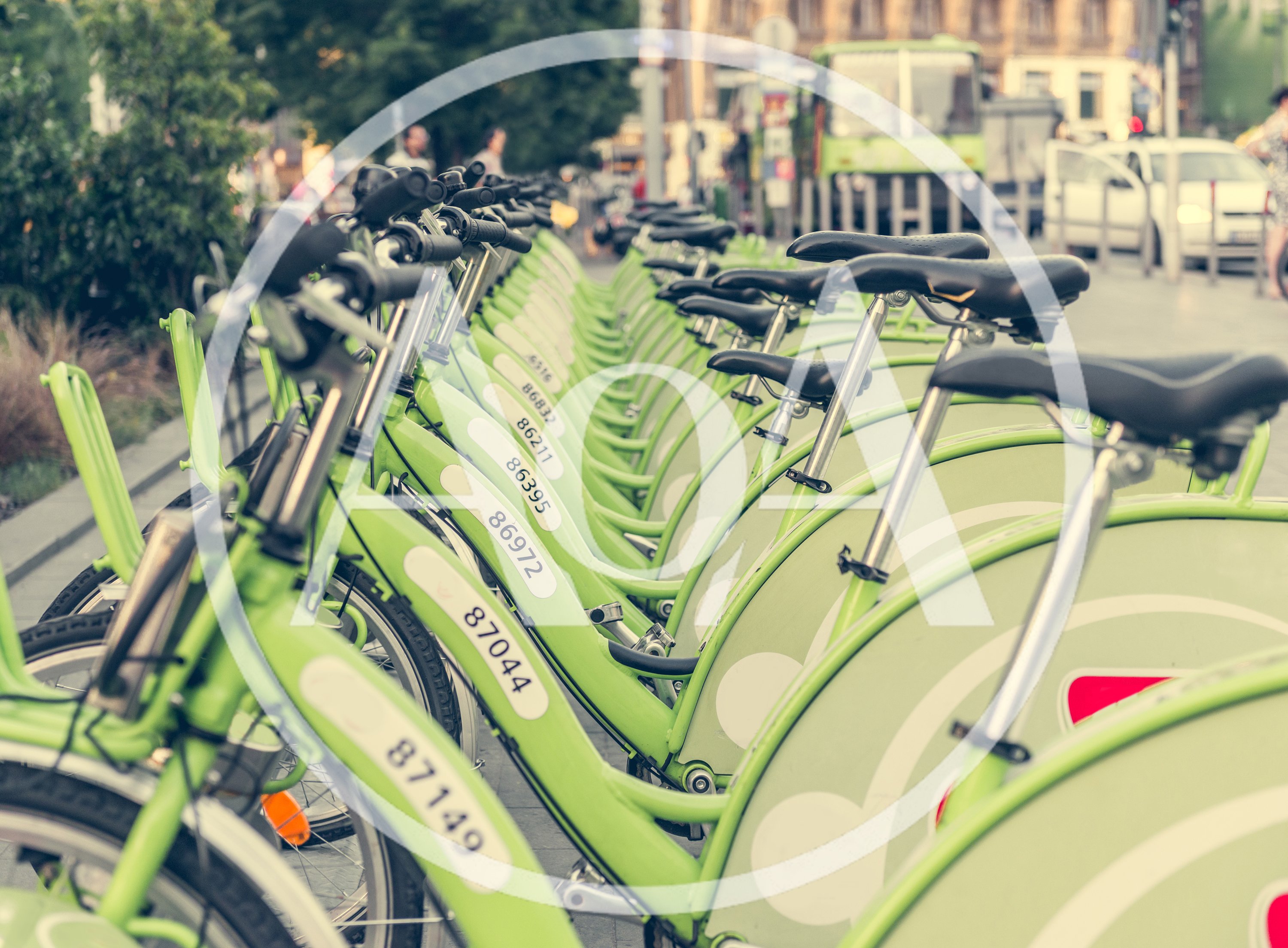 Row Of Lime Green Public Rental Bicycles