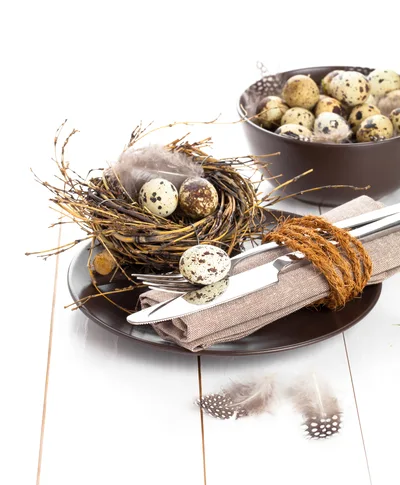 Easter Table Setting With Quail Eggs And Nest