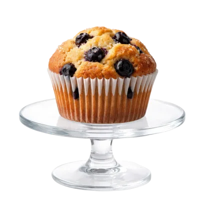 Blueberry Muffin On A Glass Cake Stand