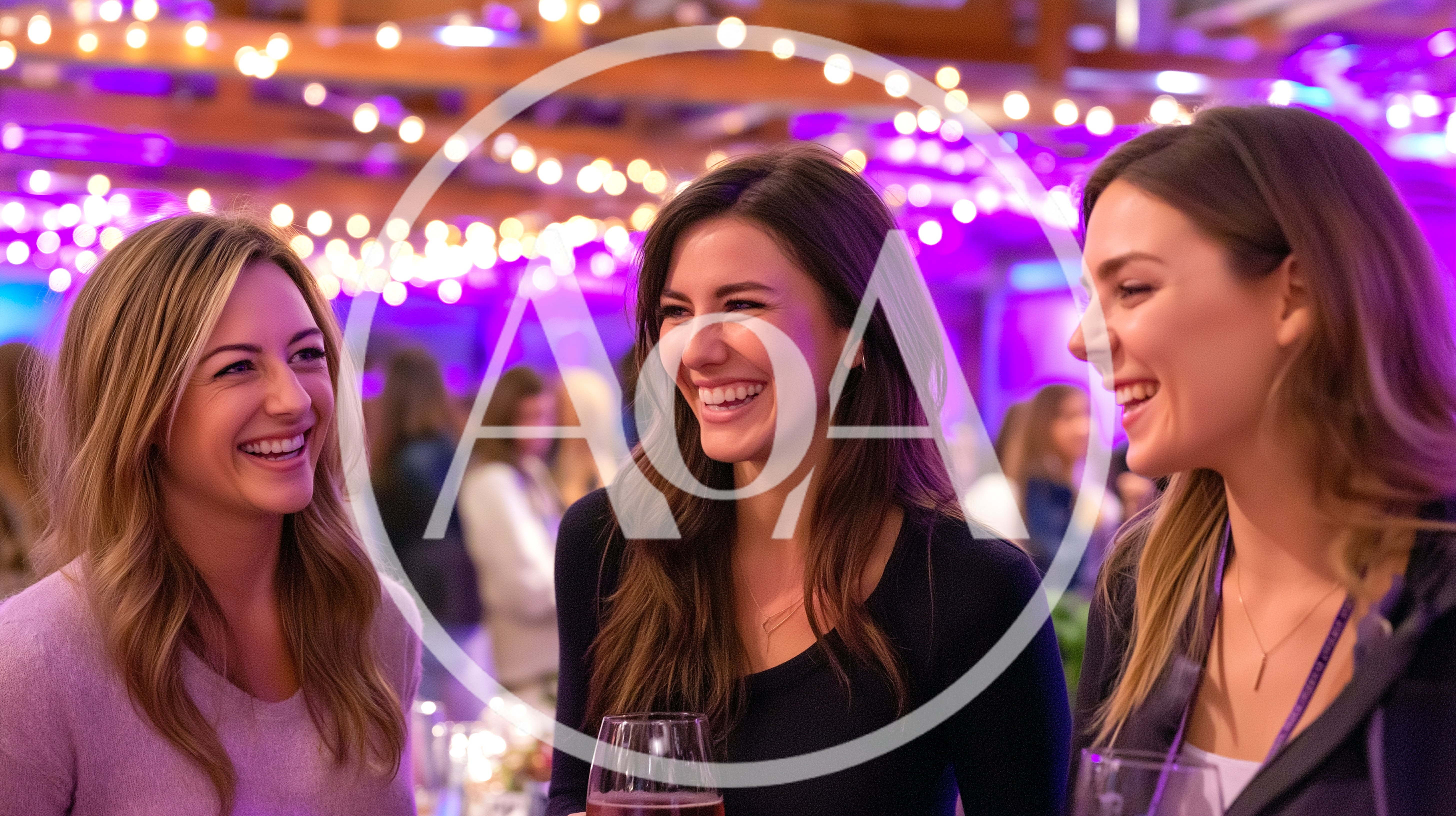 Three Happy Women Laughing Together At A Party