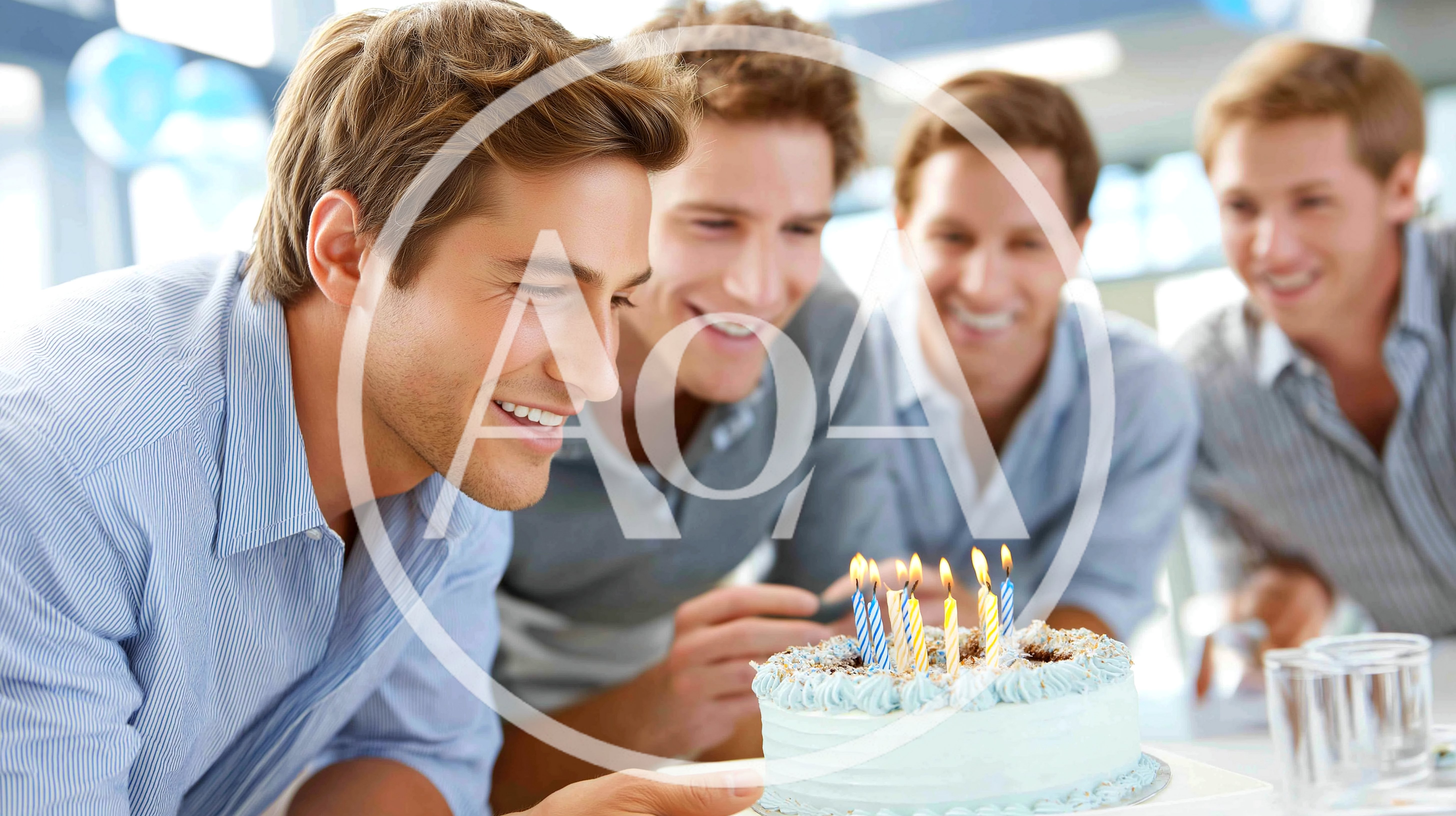 Group Of Men Celebrating Birthday With Cake