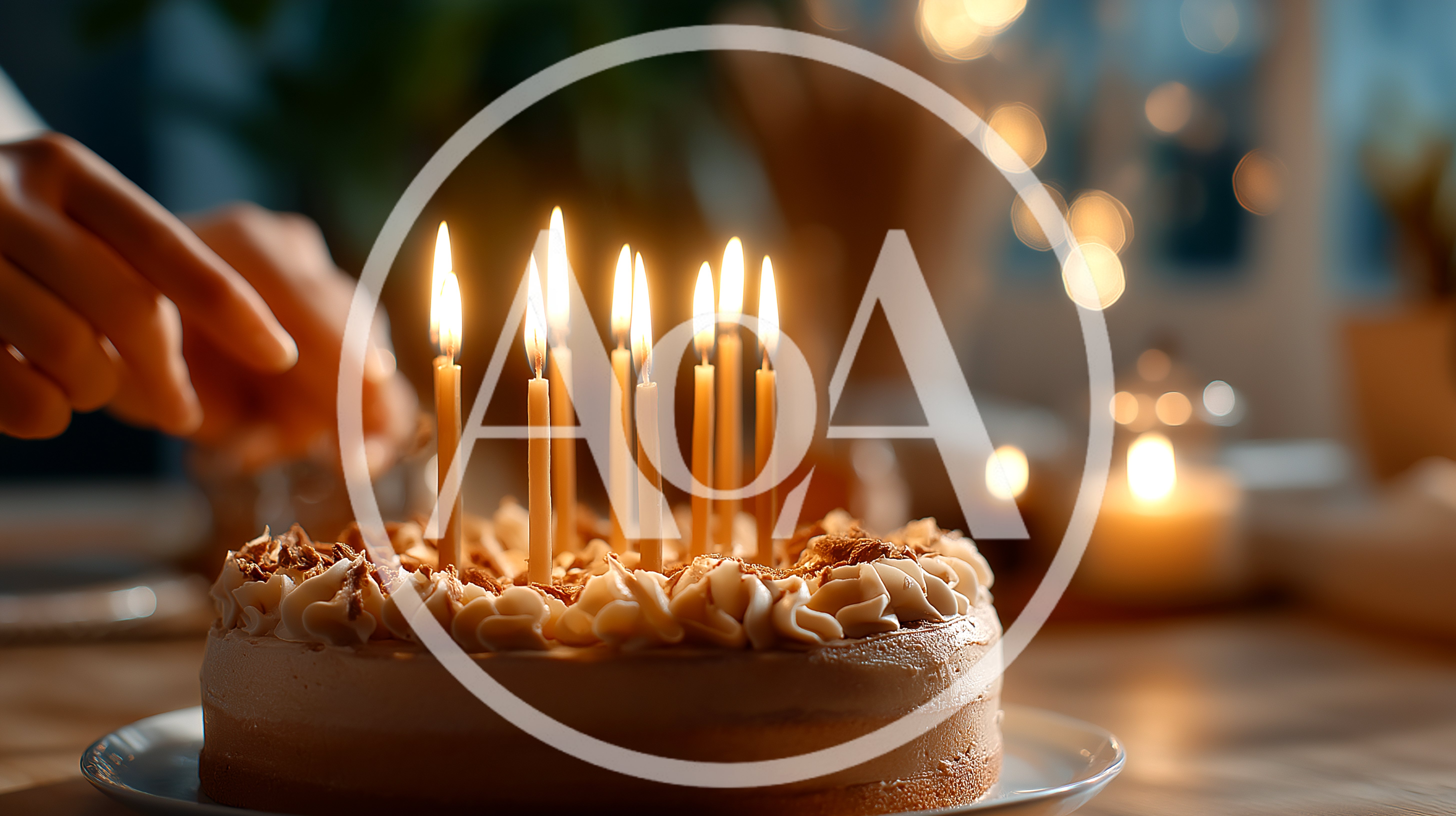Hand Lighting Candles On A Birthday Cake