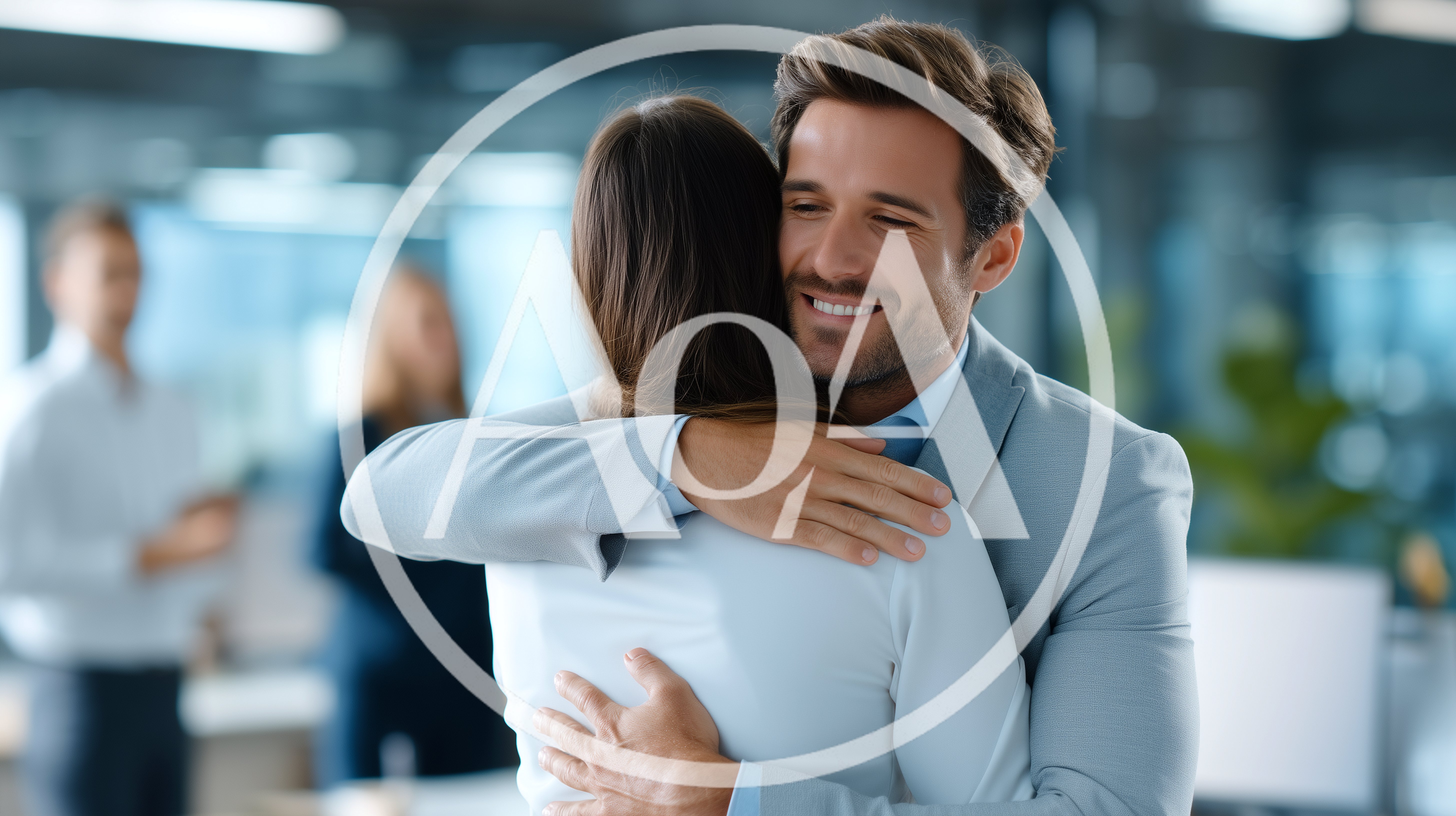 Professional Colleagues Embracing In A Modern Office Setting