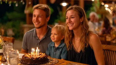 Family Celebrating Birthday With Chocolate Cake At Dinner