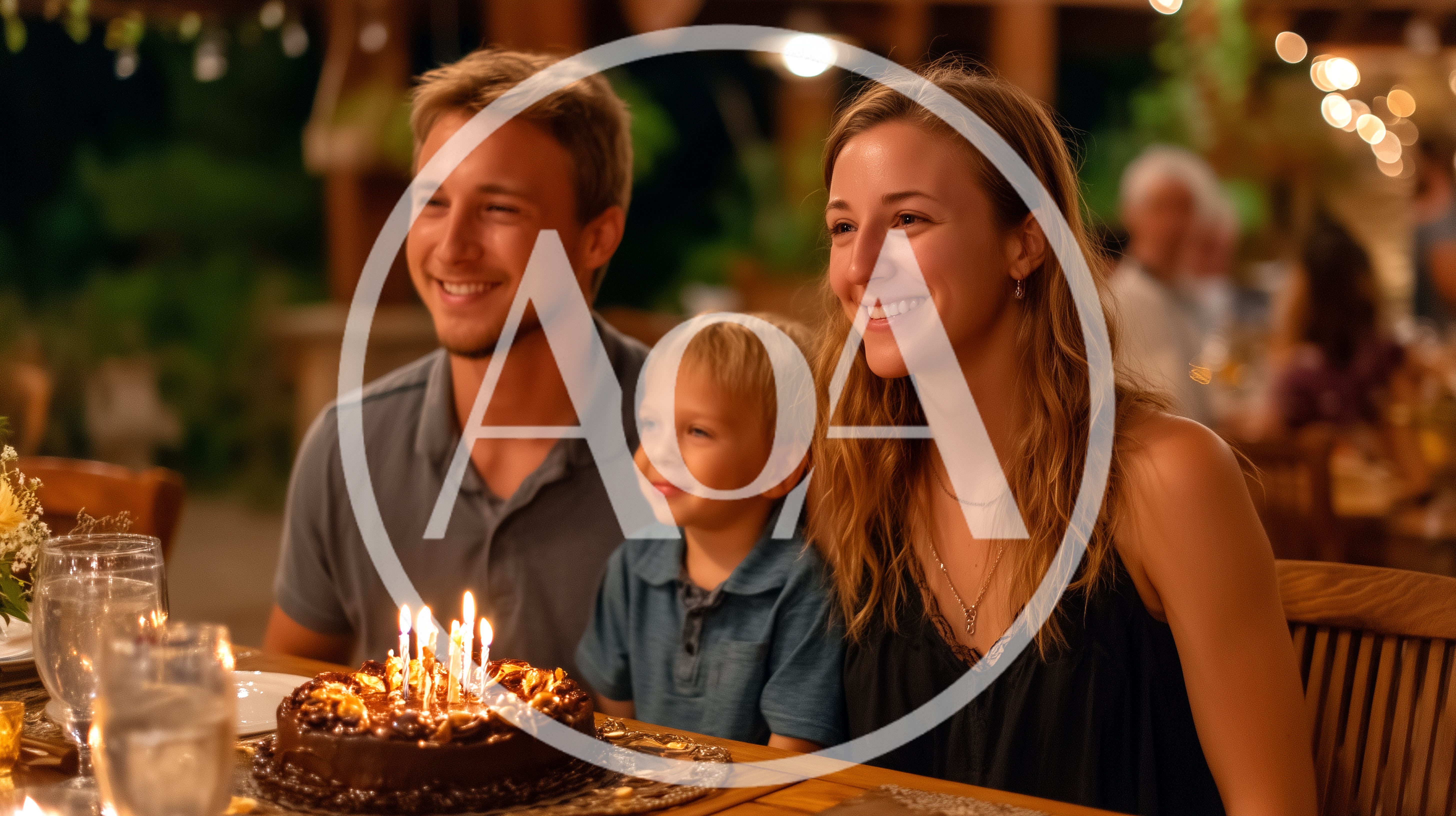 Family Celebrating Birthday With Chocolate Cake At Dinner