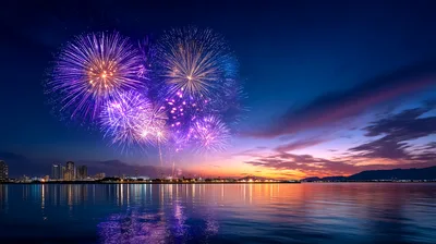 Vibrant Fireworks Display Over City Skyline At Sunset