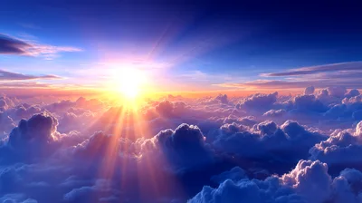 Aerial View Of Sun Rays Above Clouds