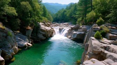 Scenic Waterfall Flowing Into A Crystal Clear River