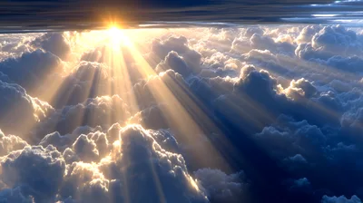 Golden Sun Rays Piercing Through Dense Clouds