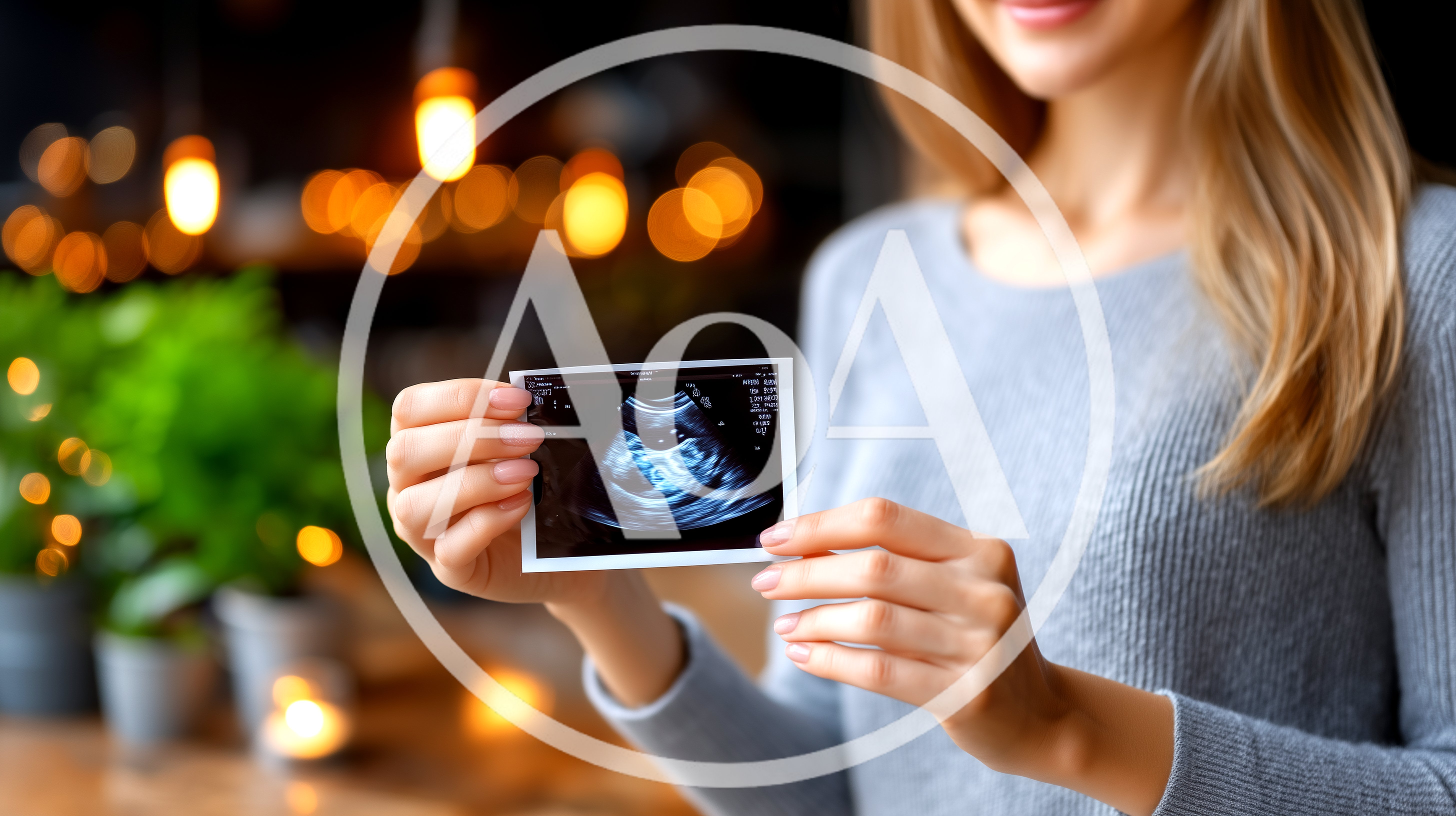 Woman Holding Ultrasound Scan Of Her Baby
