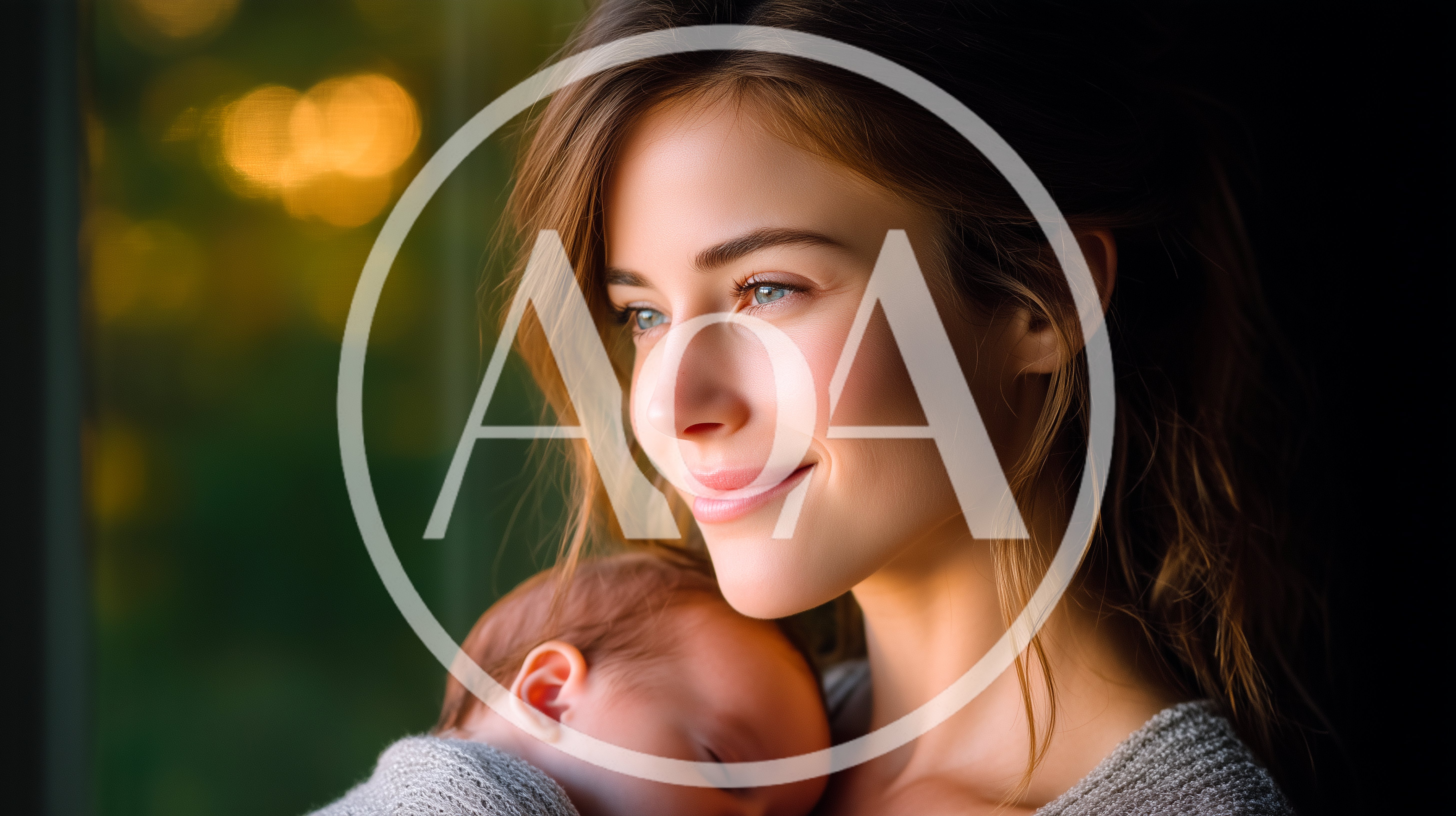 Young Mother Holding Her Sleeping Newborn Baby