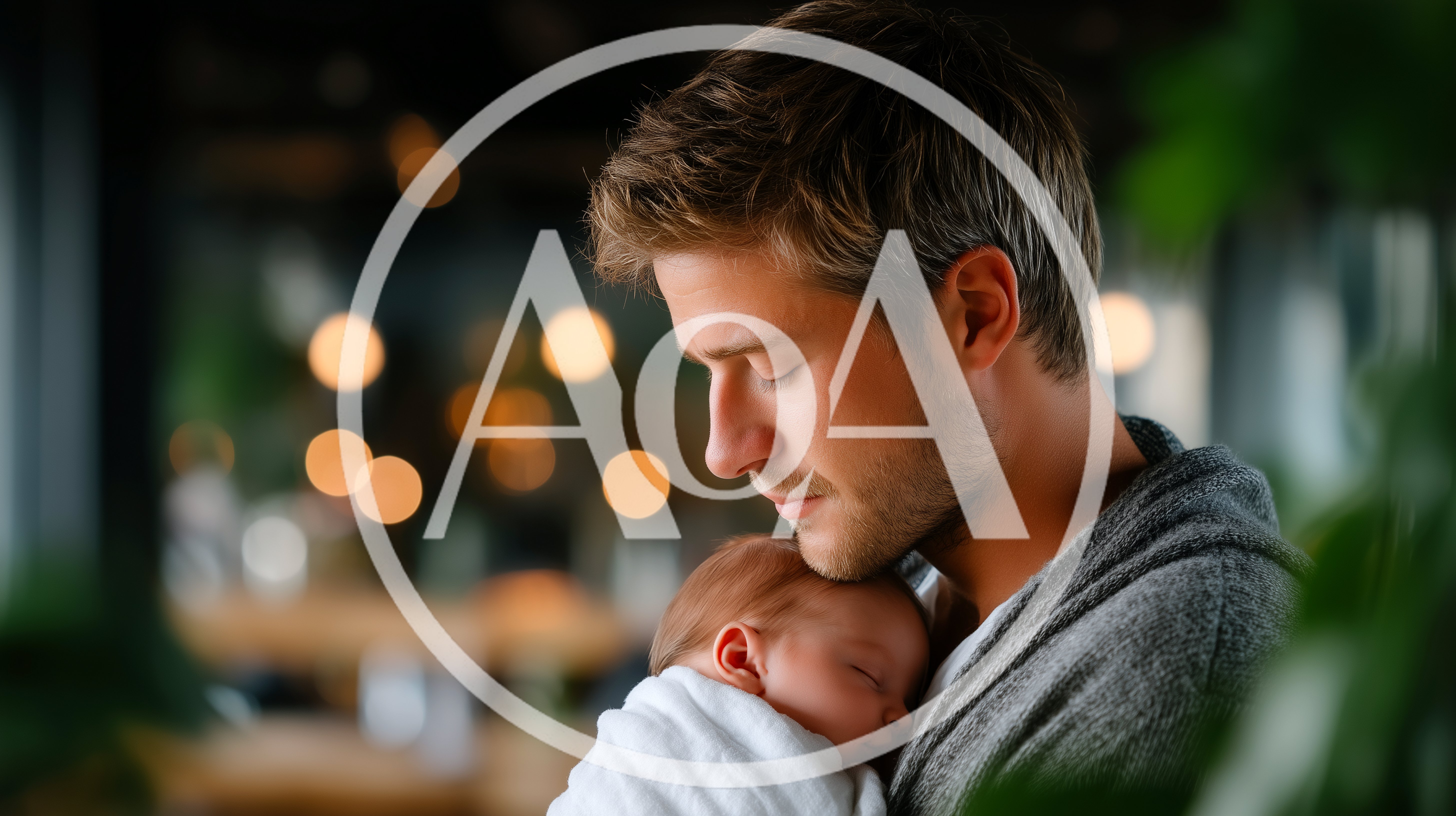 Young Father Holding His Sleeping Newborn Baby
