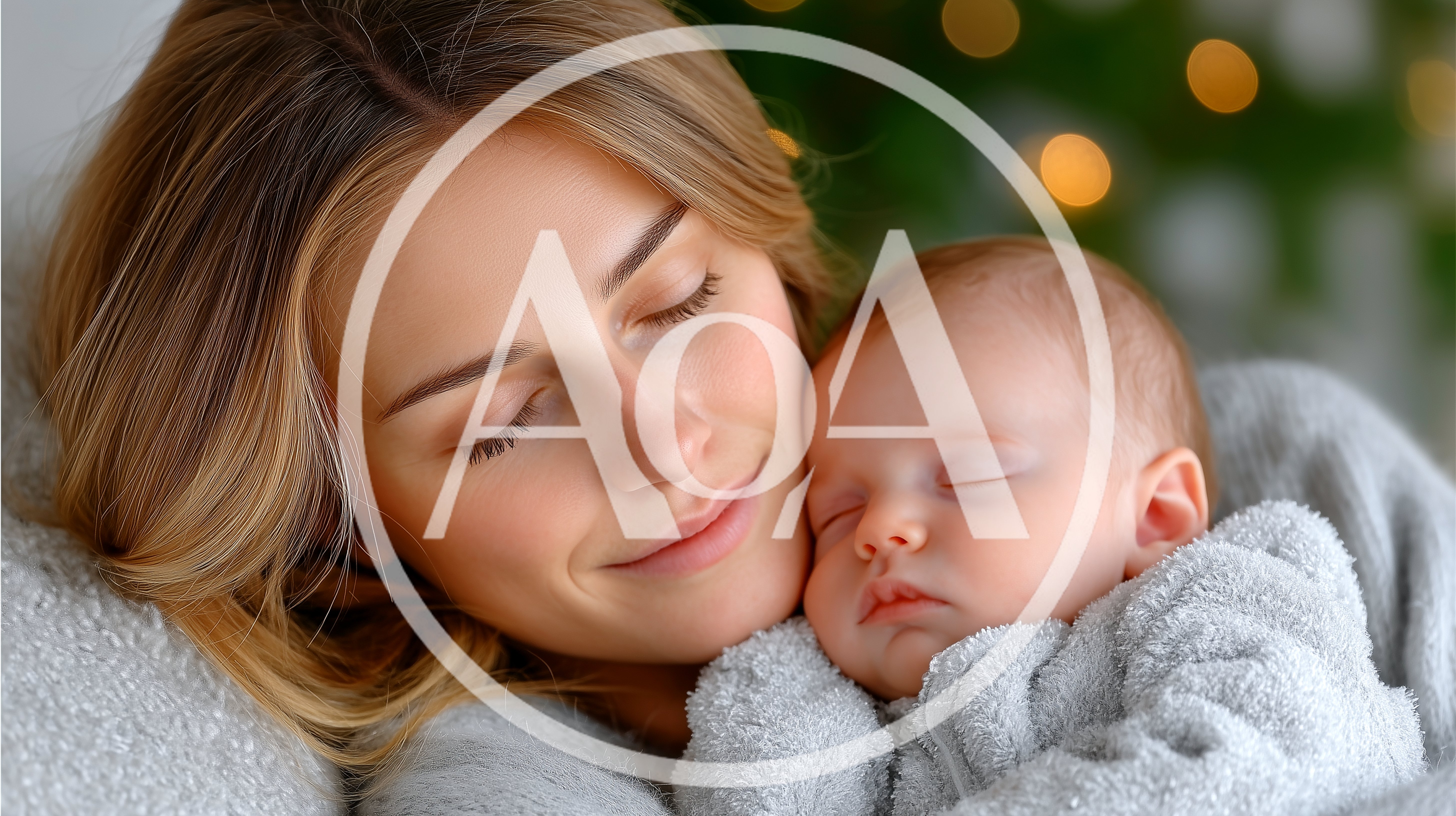 Mother Cuddling Her Sleeping Newborn Baby