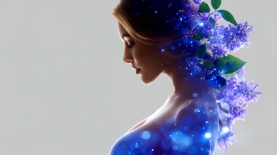 Woman Profile With Glowing Blue Flowers And Light Particles