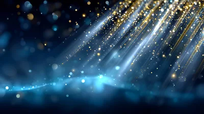 Abstract Blue Background With Golden Light Rays And Particles