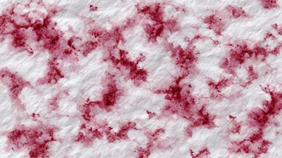 Abstract Red Ink Bleed On Textured White Paper