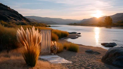 Boho Wedding Arch Setup On Riverbank At Sunset