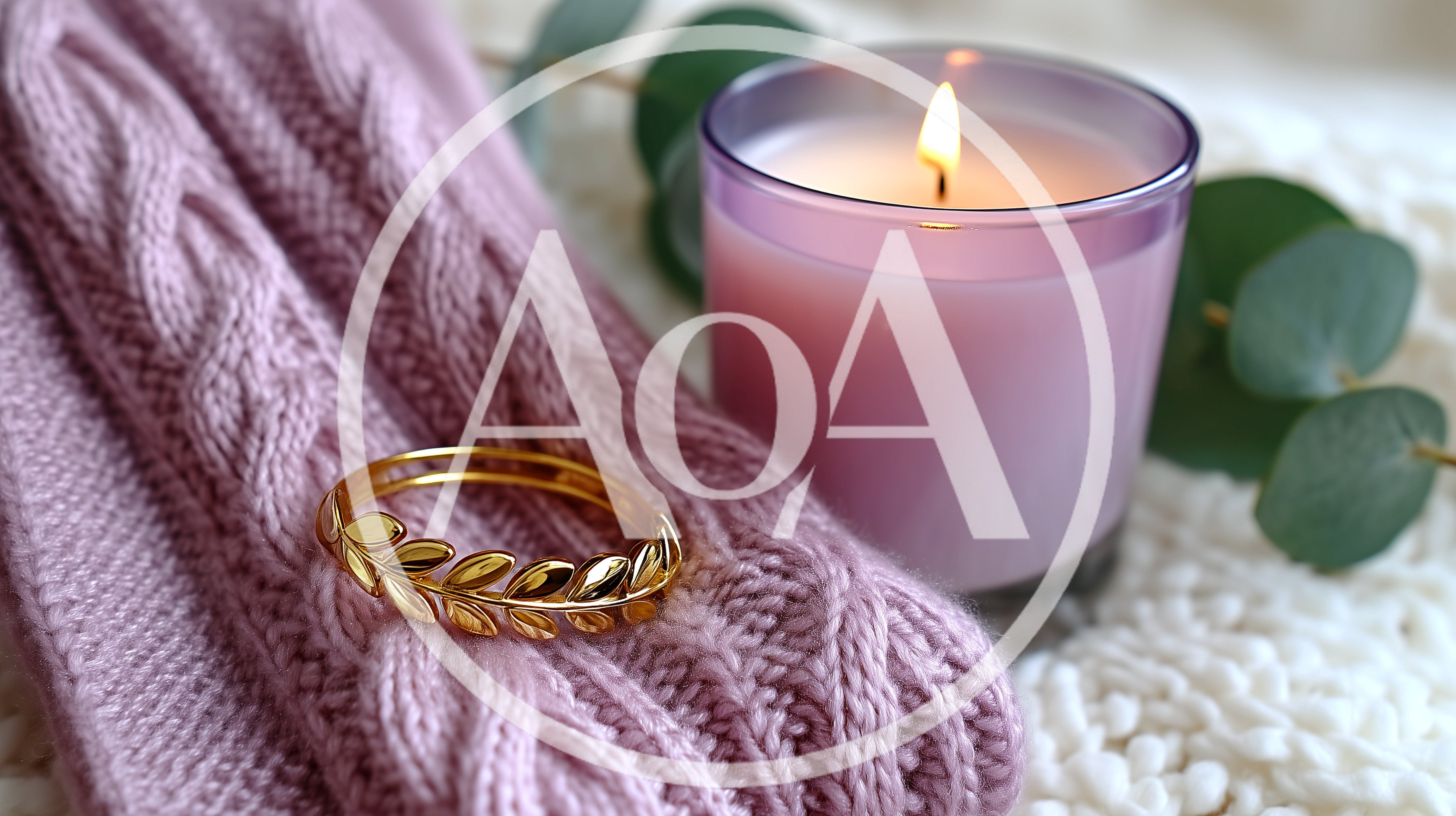 Gold Leaf Bracelet Resting On A Knitted Scarf