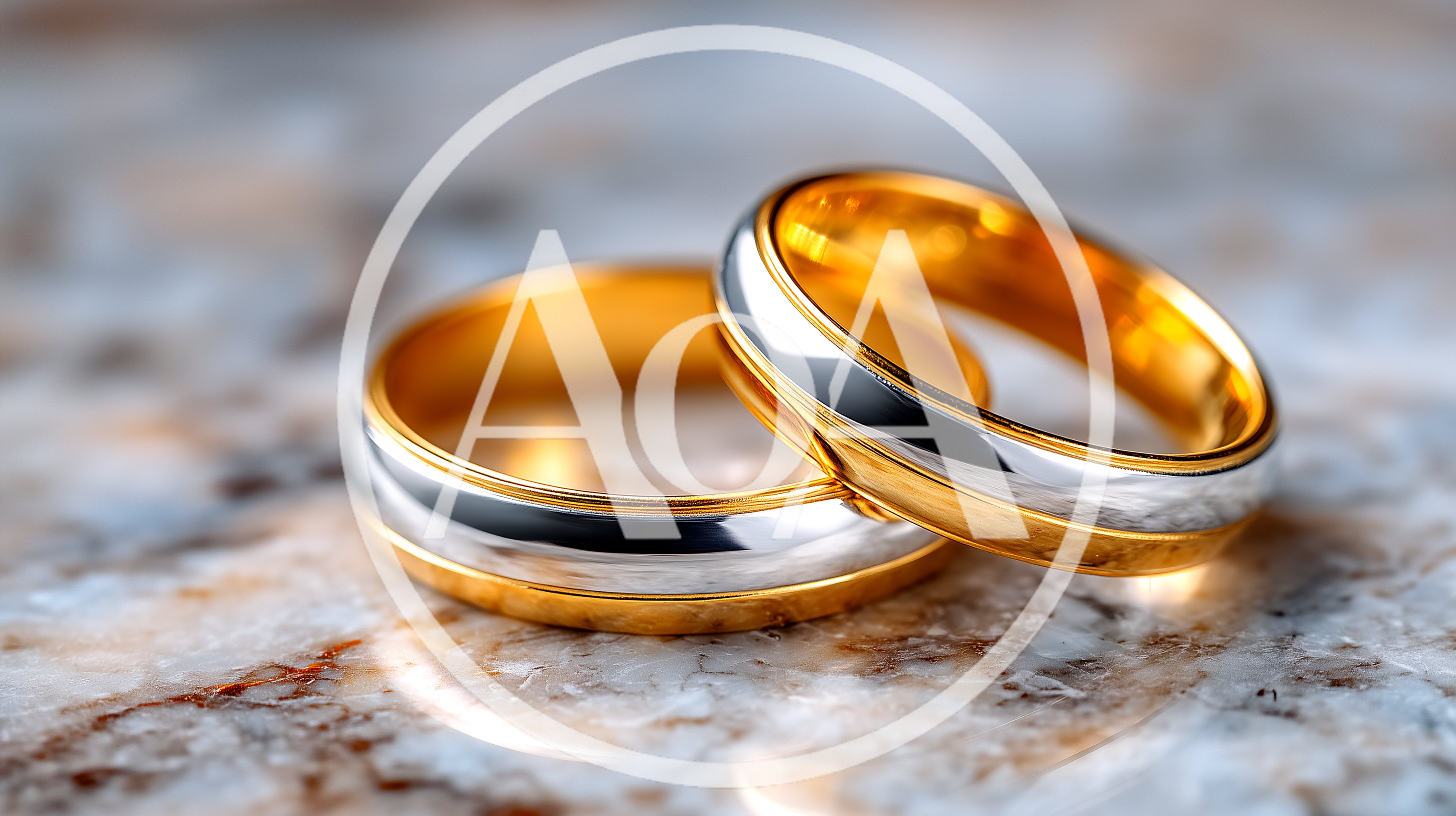 Two Interlocking Gold And Silver Wedding Rings
