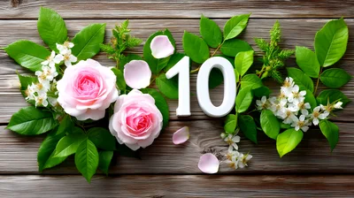 Number Ten With Pink Roses On Wooden Background