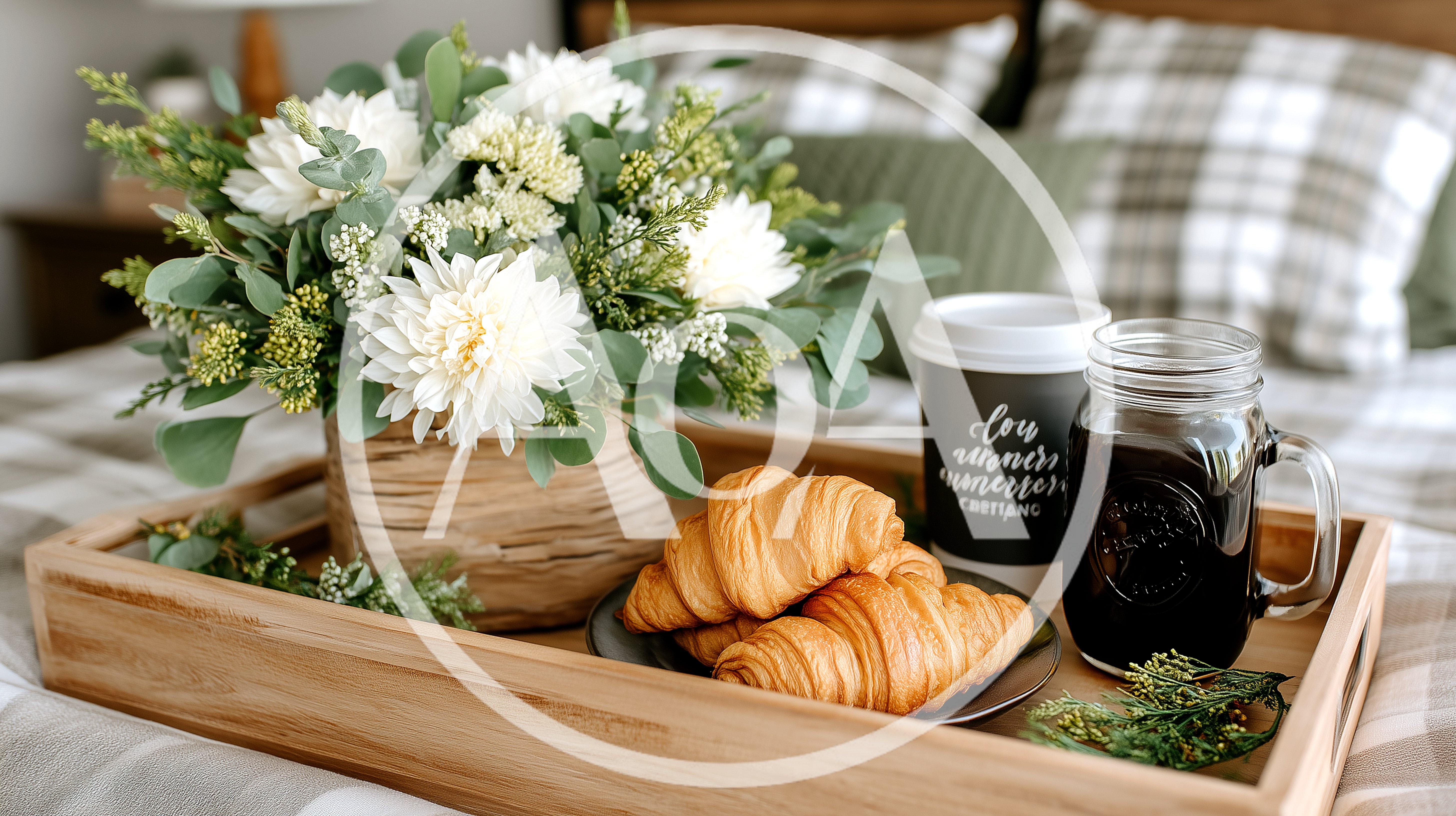 Breakfast Tray With Croissants And Coffee On Bed