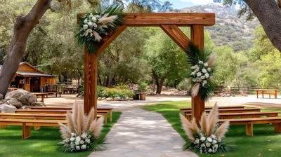 Wooden Wedding Arch With Floral Decorations In Outdoor Venue