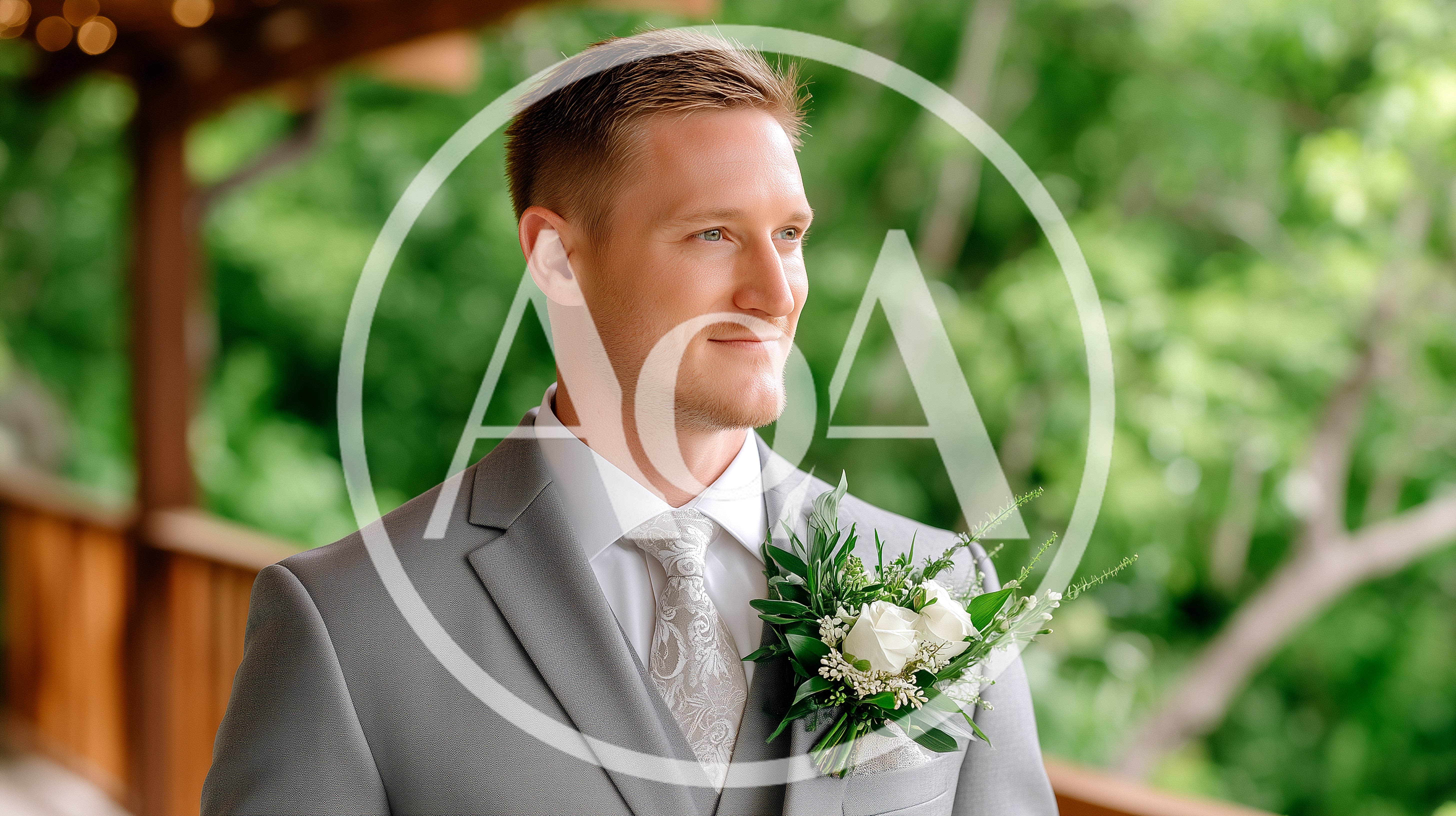 Groom Wearing Grey Suit With Floral Boutonniere