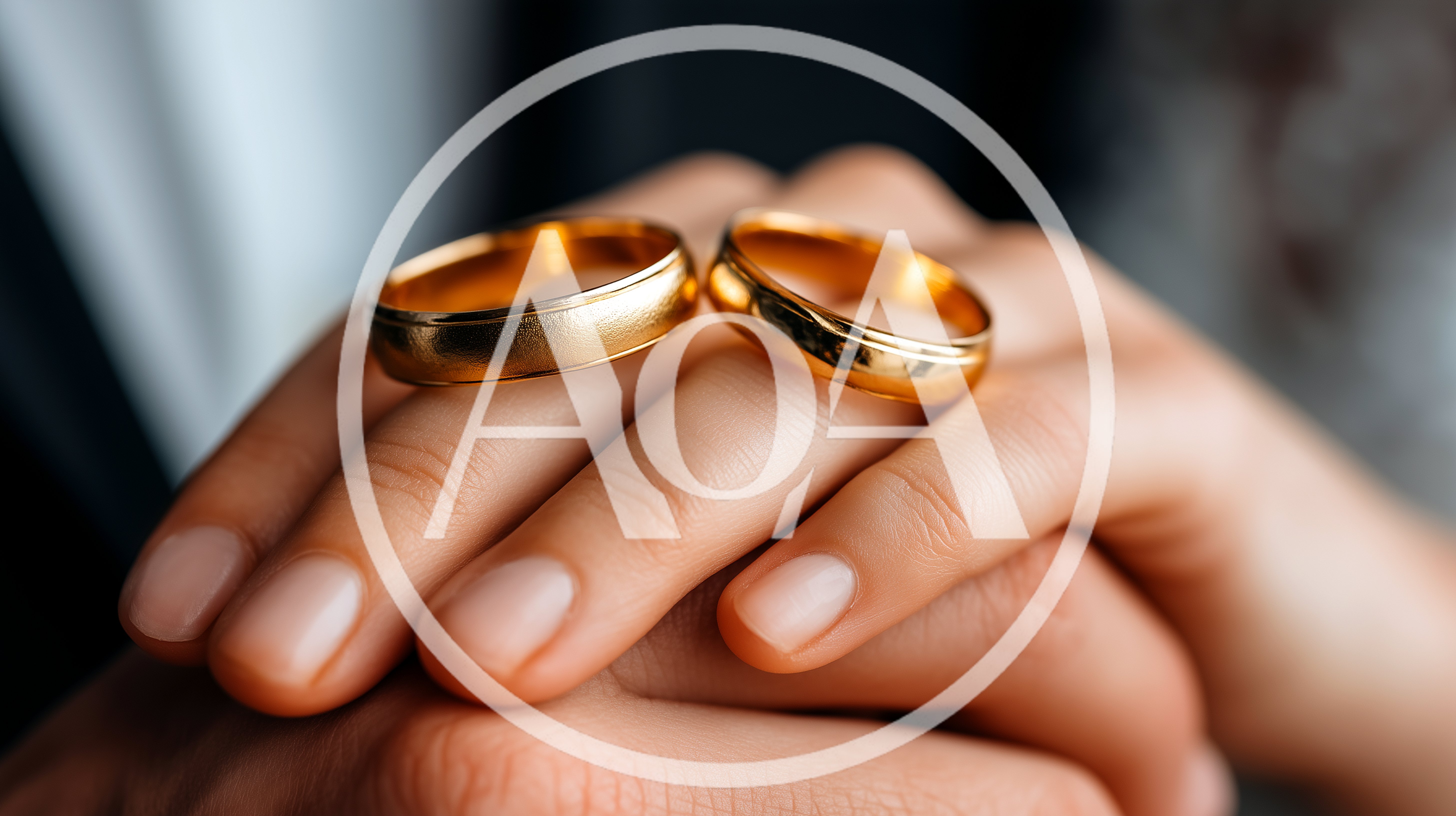 Close Up Of A Couple Holding Wedding Rings