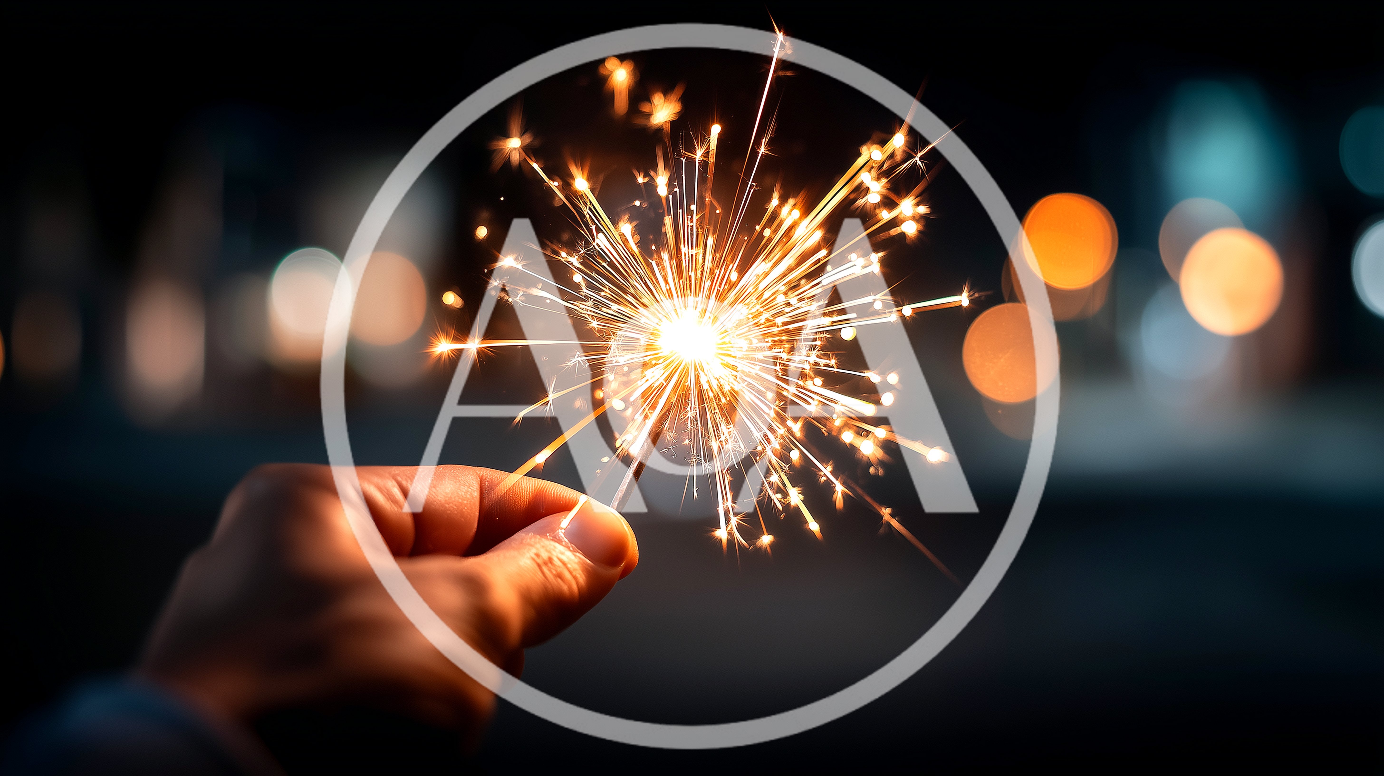 Hand Holding A Burning Sparkler At Night