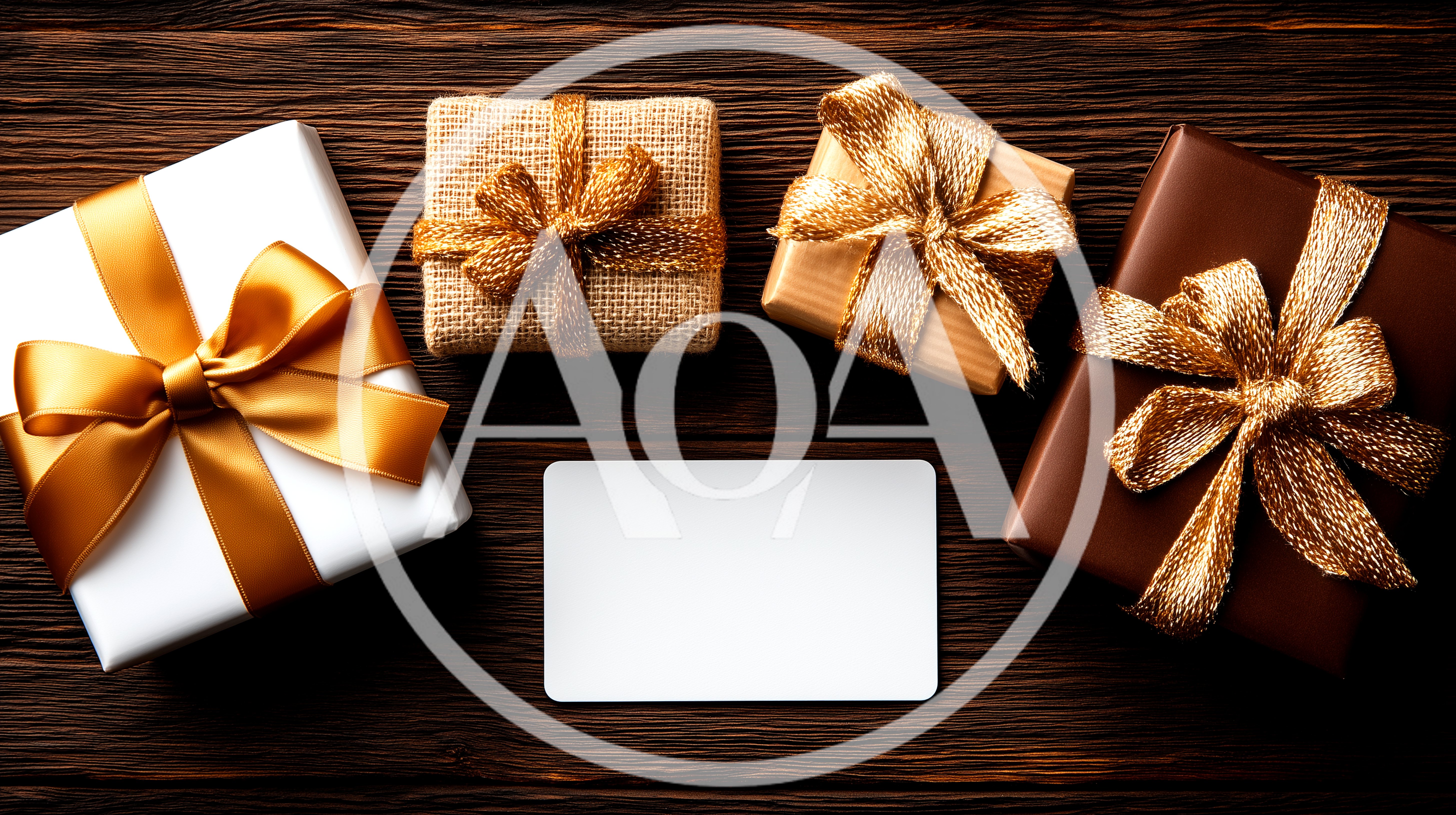 Four Wrapped Gift Boxes With Gold Ribbons