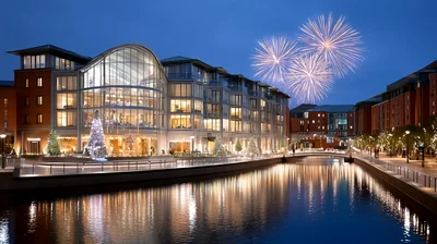 Fireworks Over Modern Waterfront Building At Night